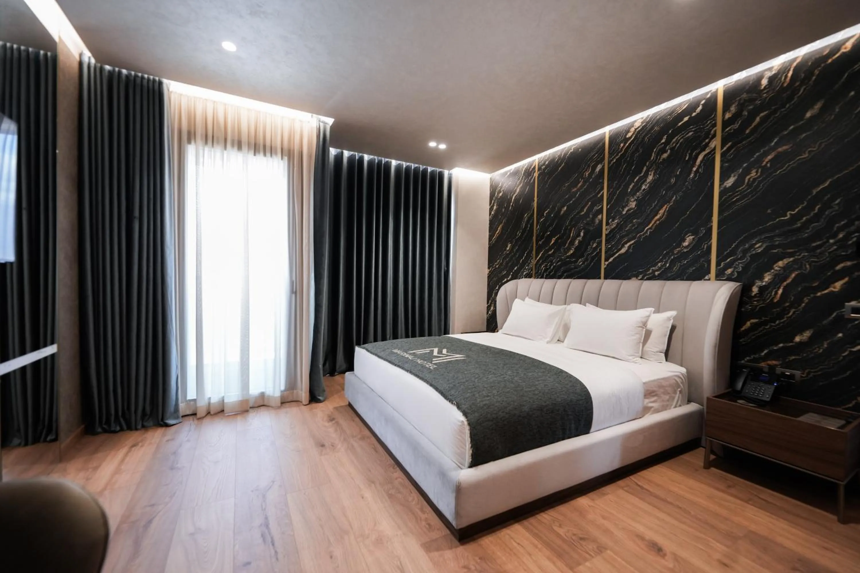 Photo of the whole room, Bed in Marinaj Hotel & SPA