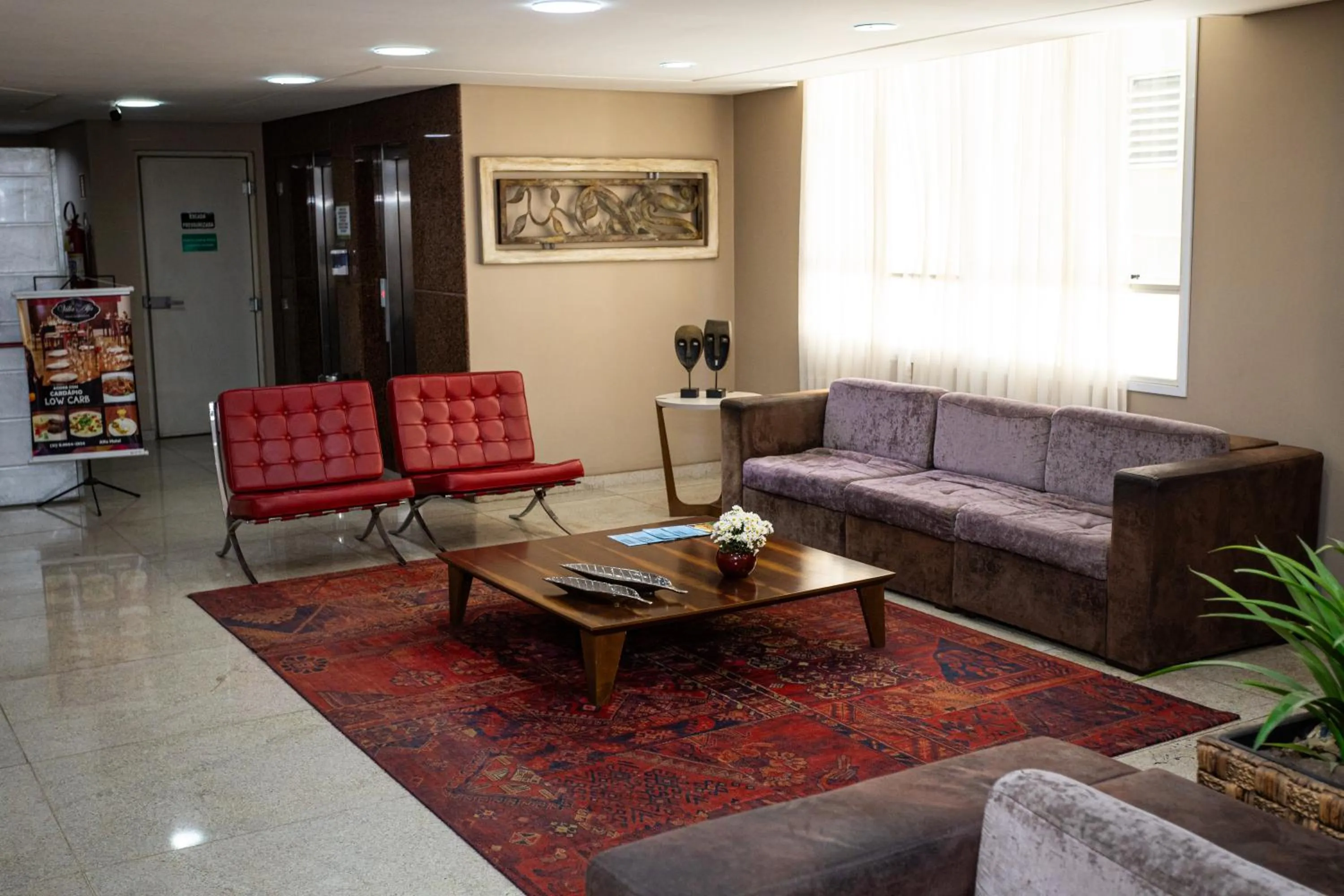 Living room in Alfa Hotel