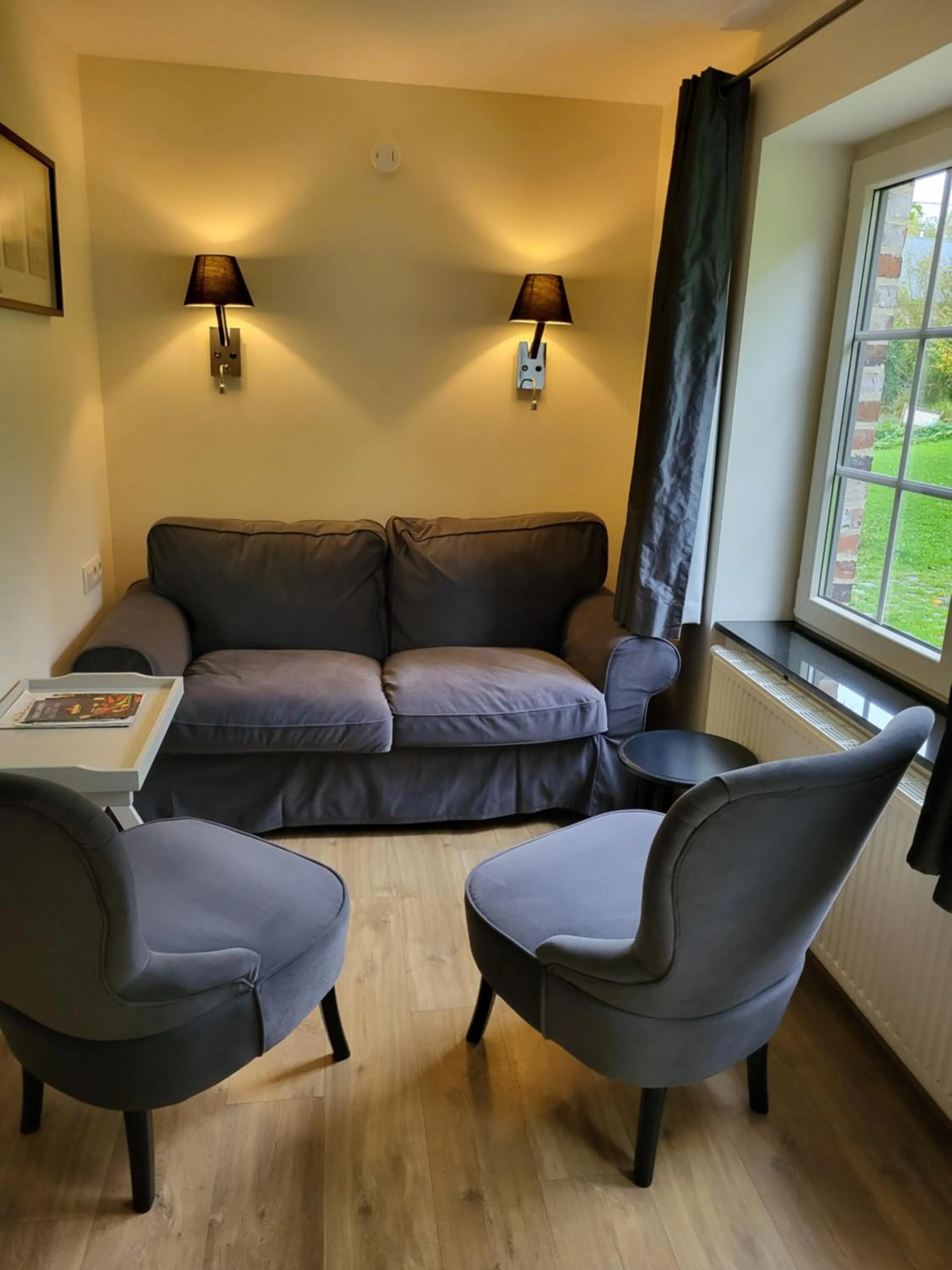 Seating area in B&B Le Bois de Champia