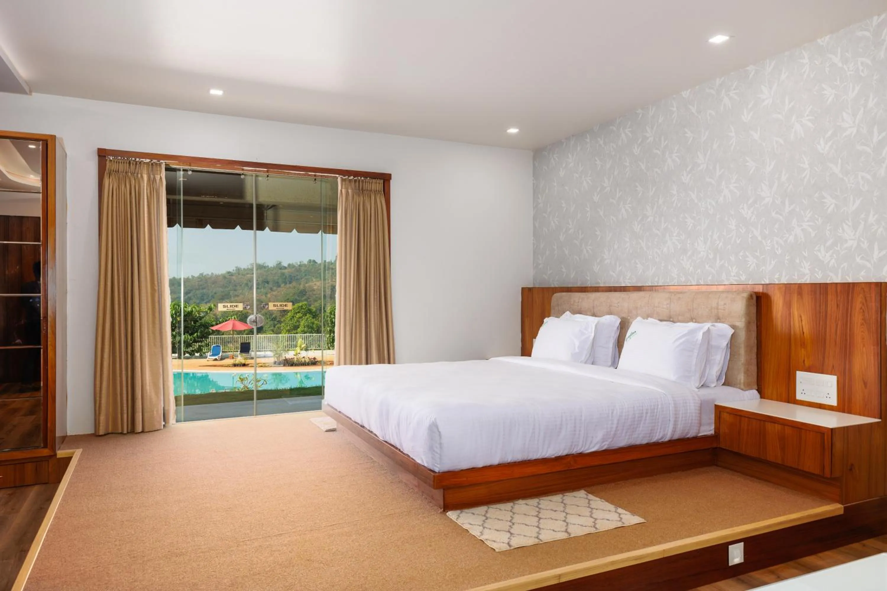 Photo of the whole room, Bed in Urmilaa Green County Resort 35 KM From Kolhapur