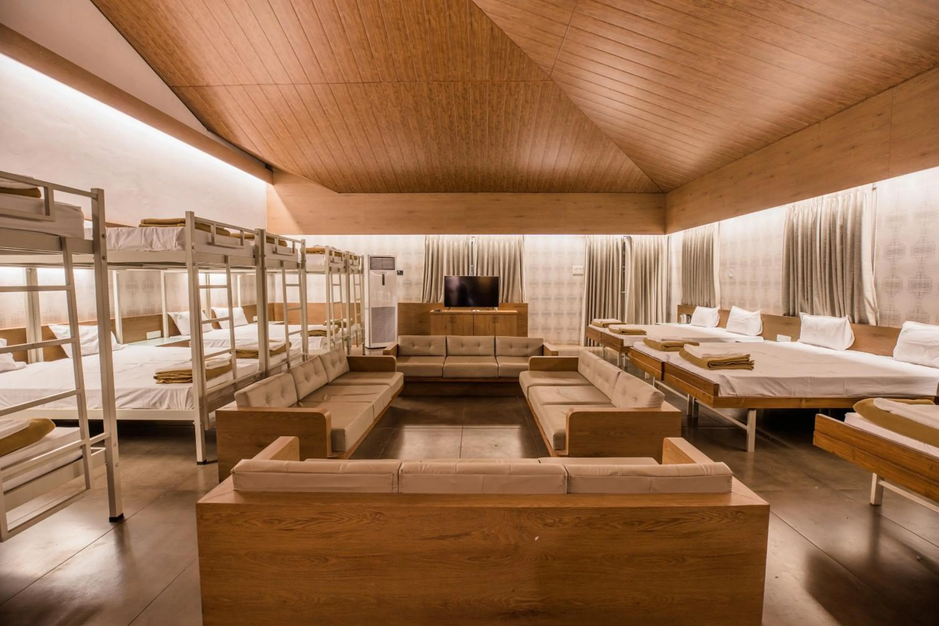 Seating area, Bed in Urmilaa Green County Resort 35 KM From Kolhapur