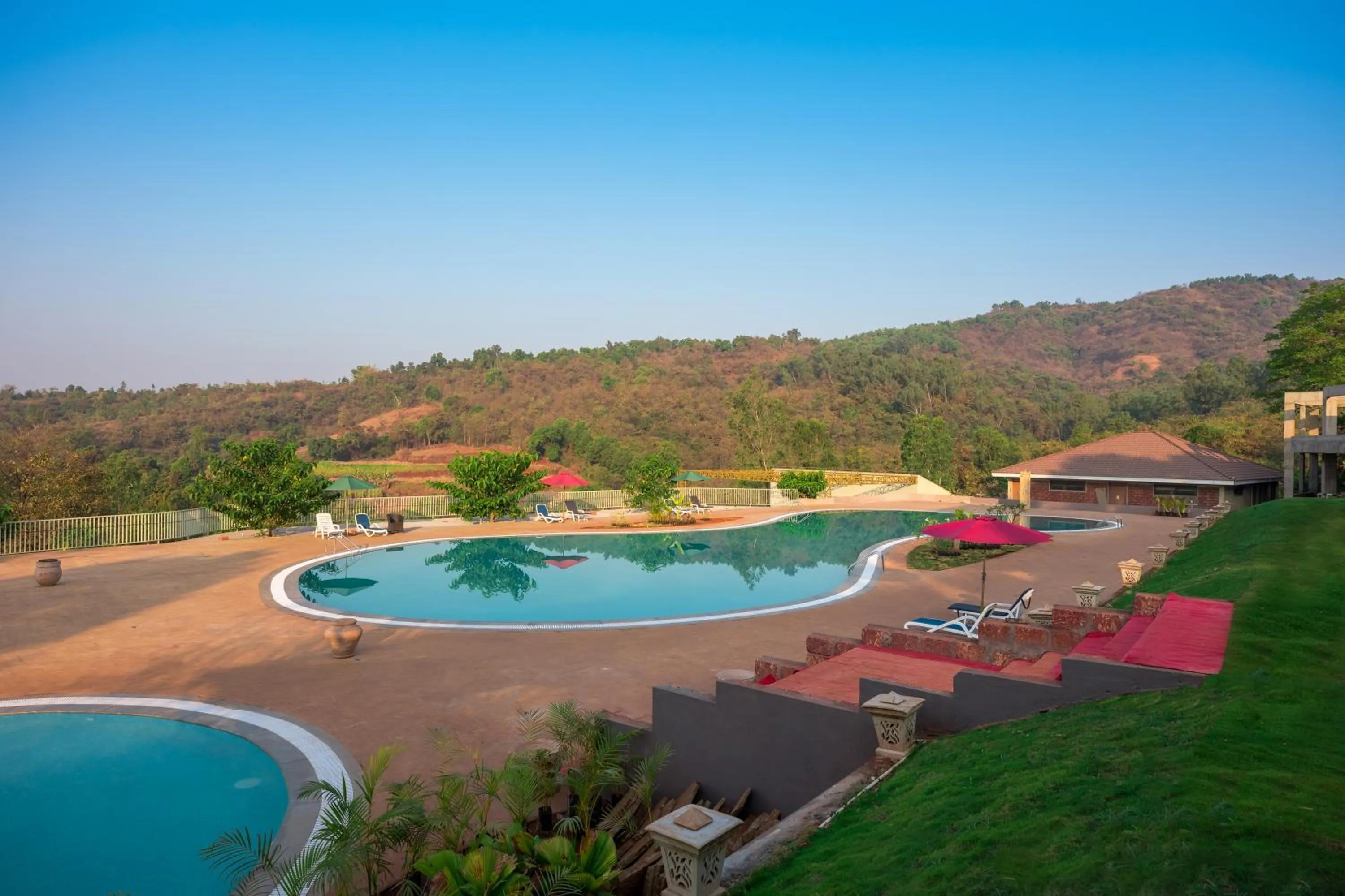 Swimming pool in Urmilaa Green County Resort 35 KM From Kolhapur