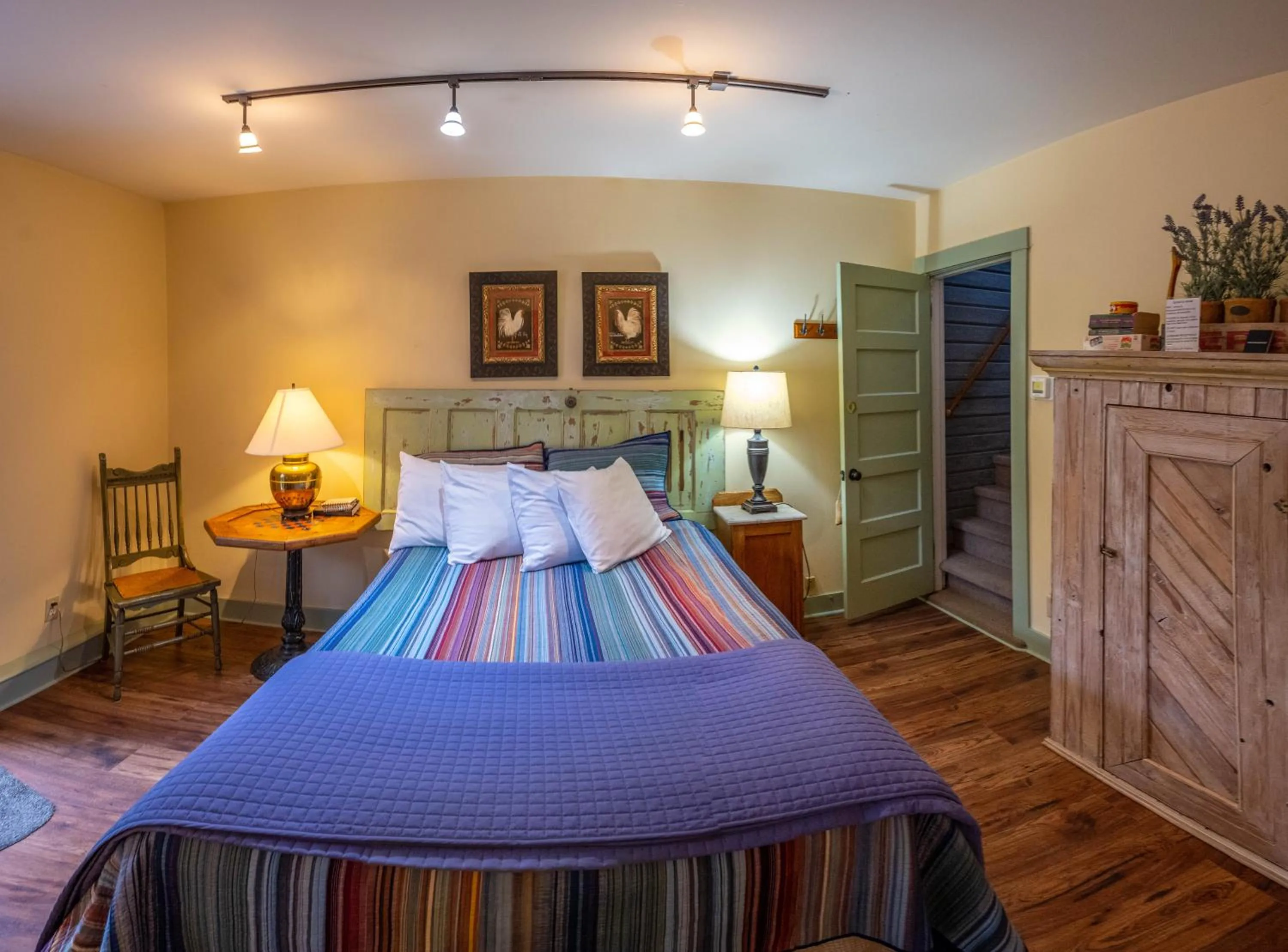 Bed in Clementine's Guest House & Vacation Rentals