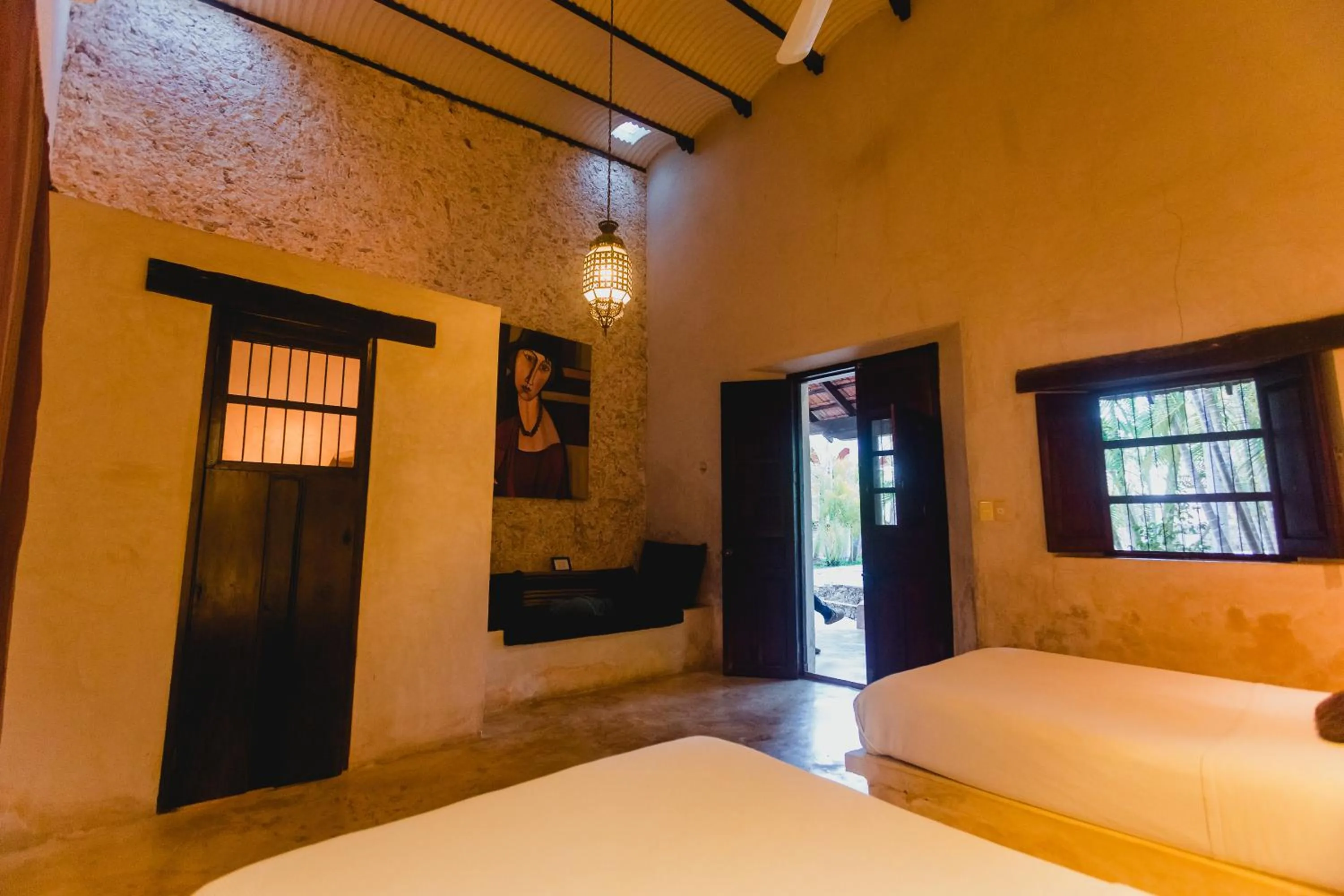 Photo of the whole room, Bed in Hacienda Sacnicte