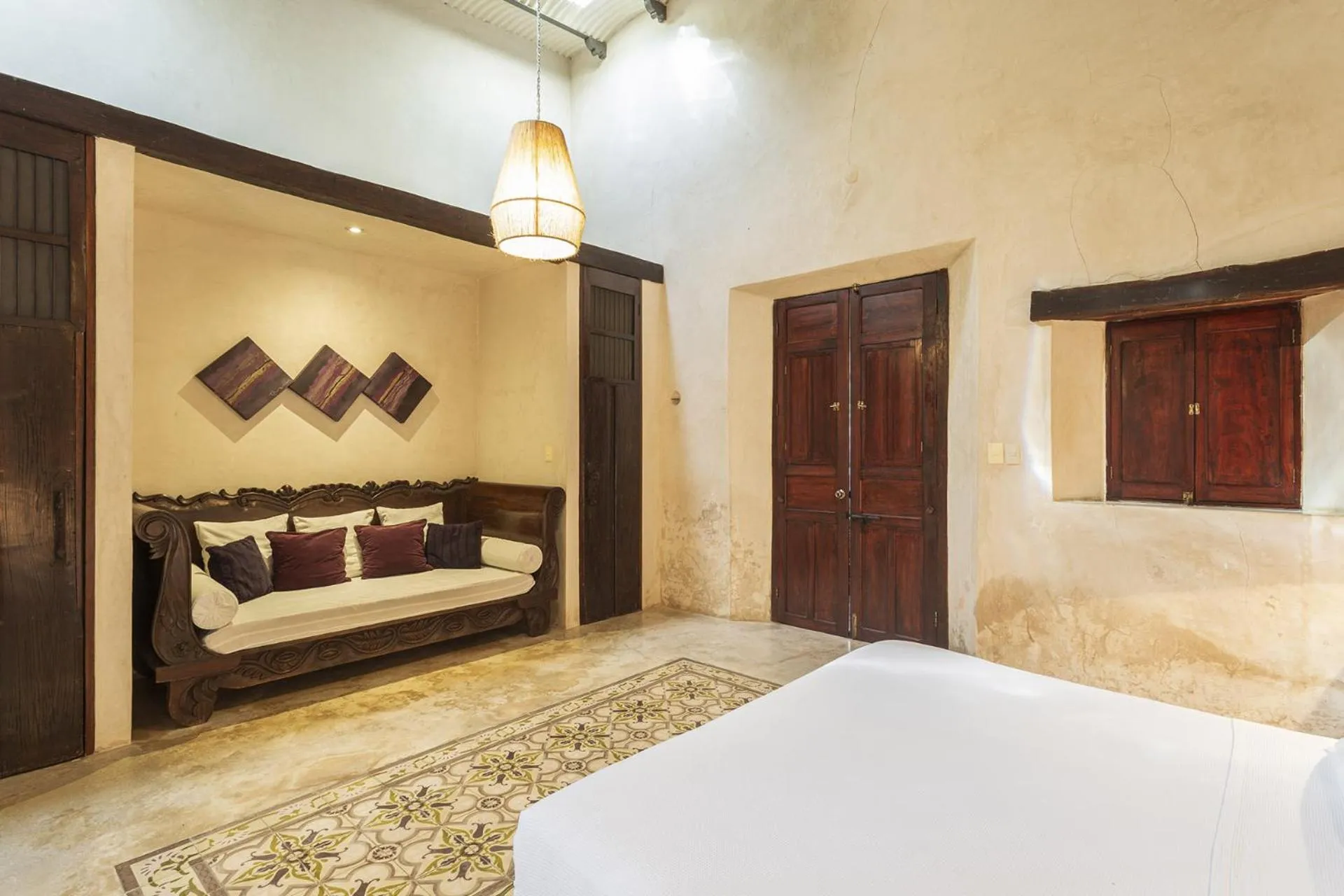 Seating area, Bed in Hacienda Sacnicte