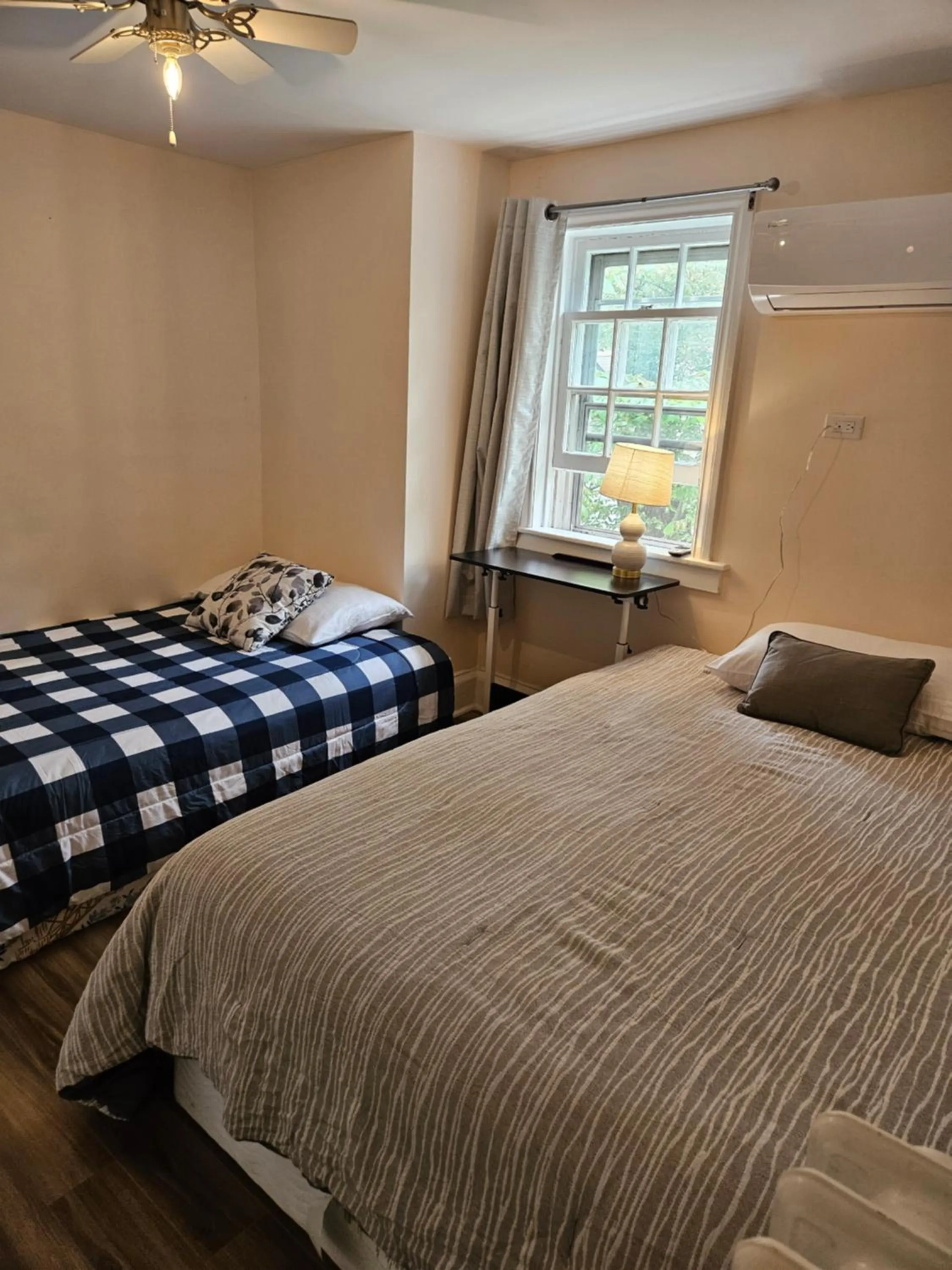 Bed in Sunflower Guest Suites