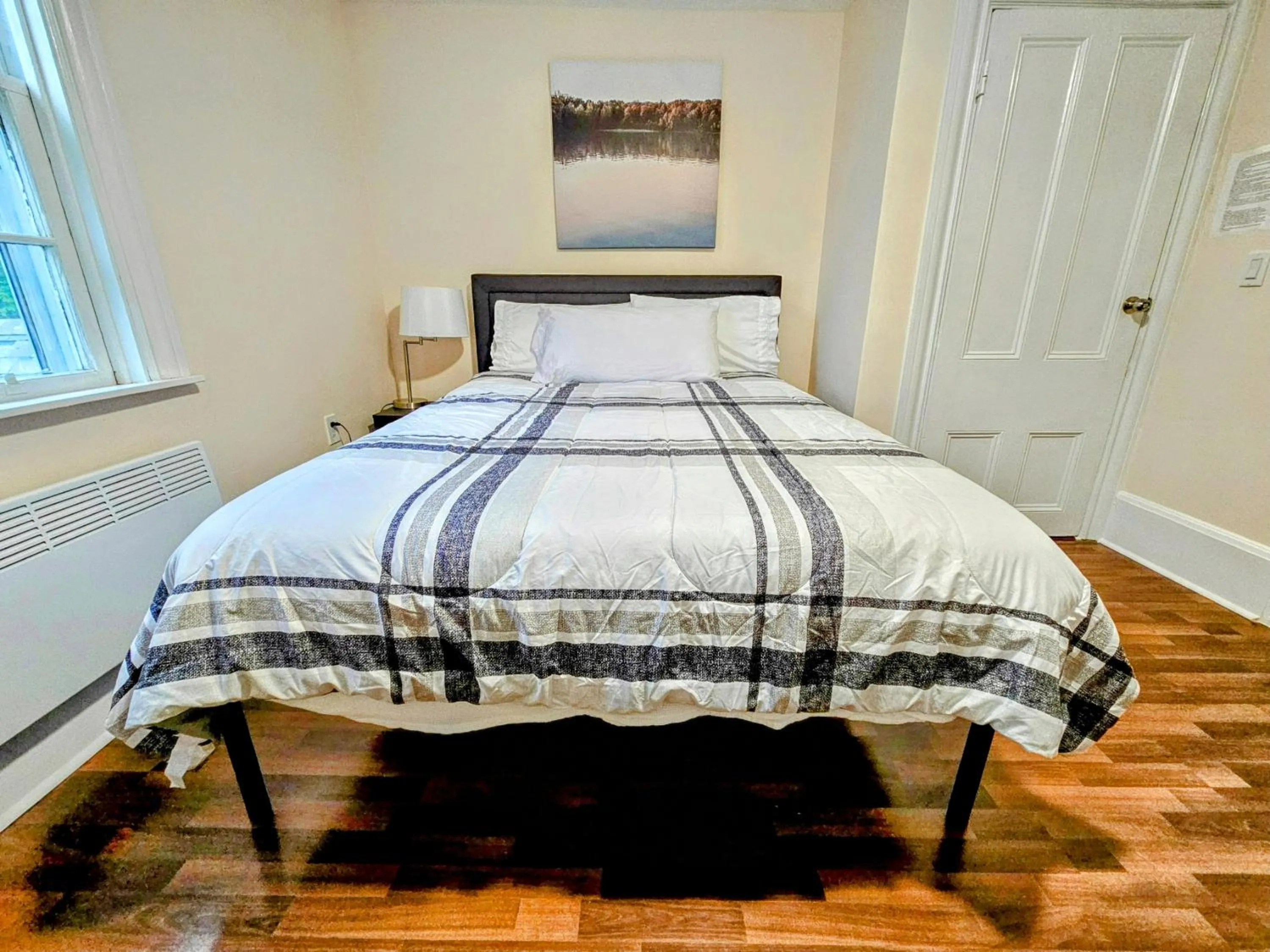 Bed in Sunflower Guest Suites