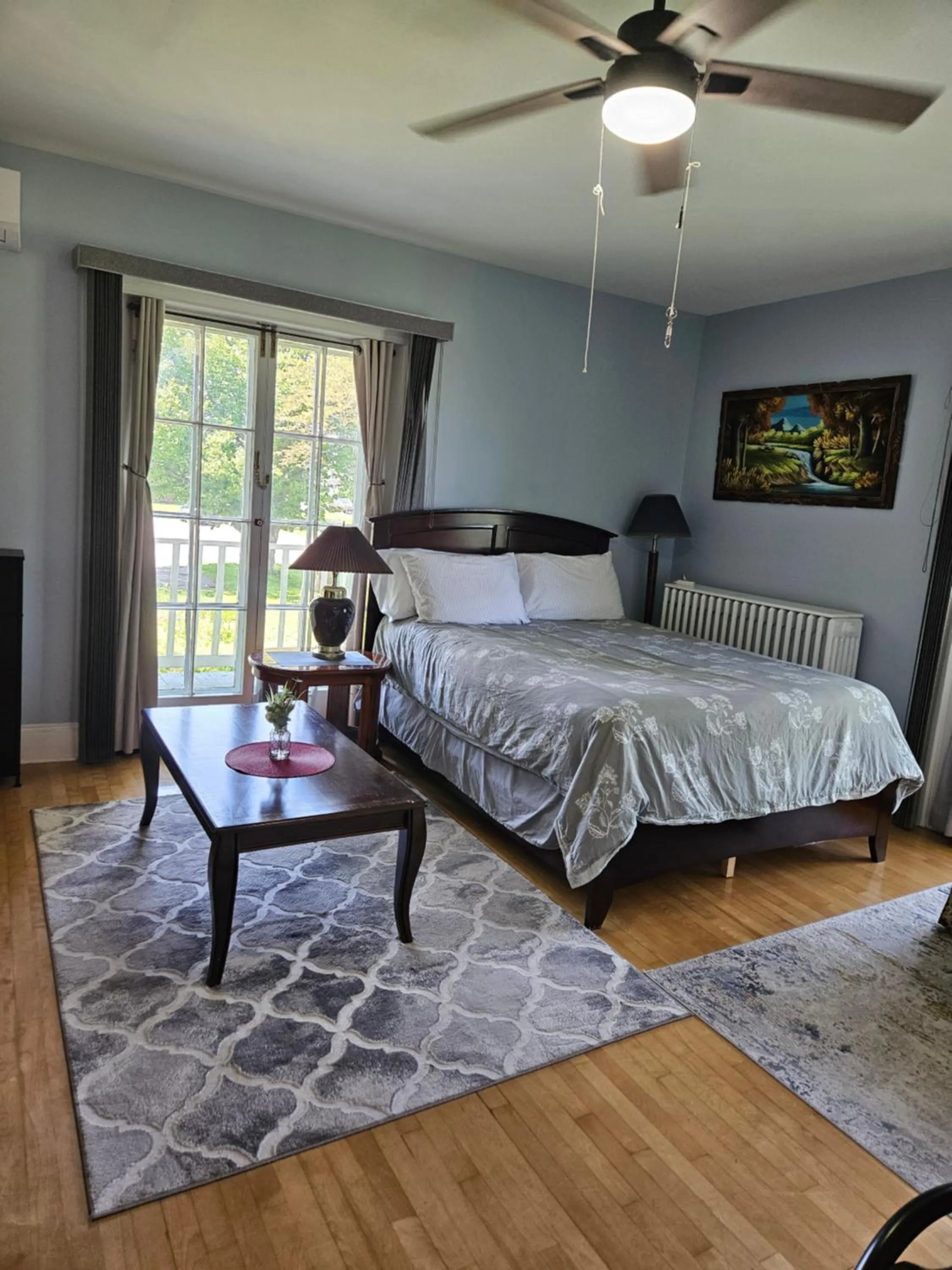 Bed in Sunflower Guest Suites