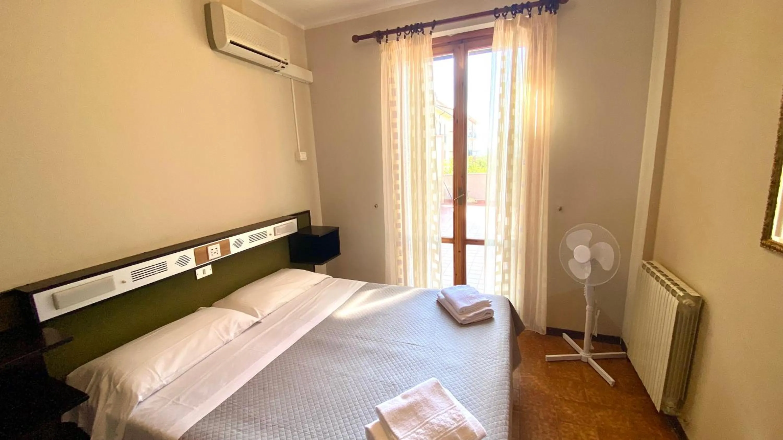 Photo of the whole room in Umbria Green Central Rooms