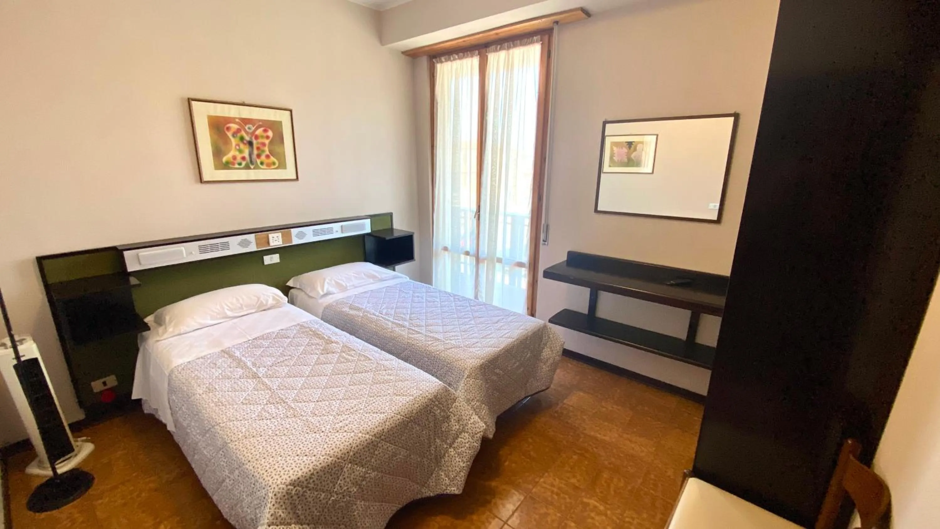 Bed in Umbria Green Central Rooms