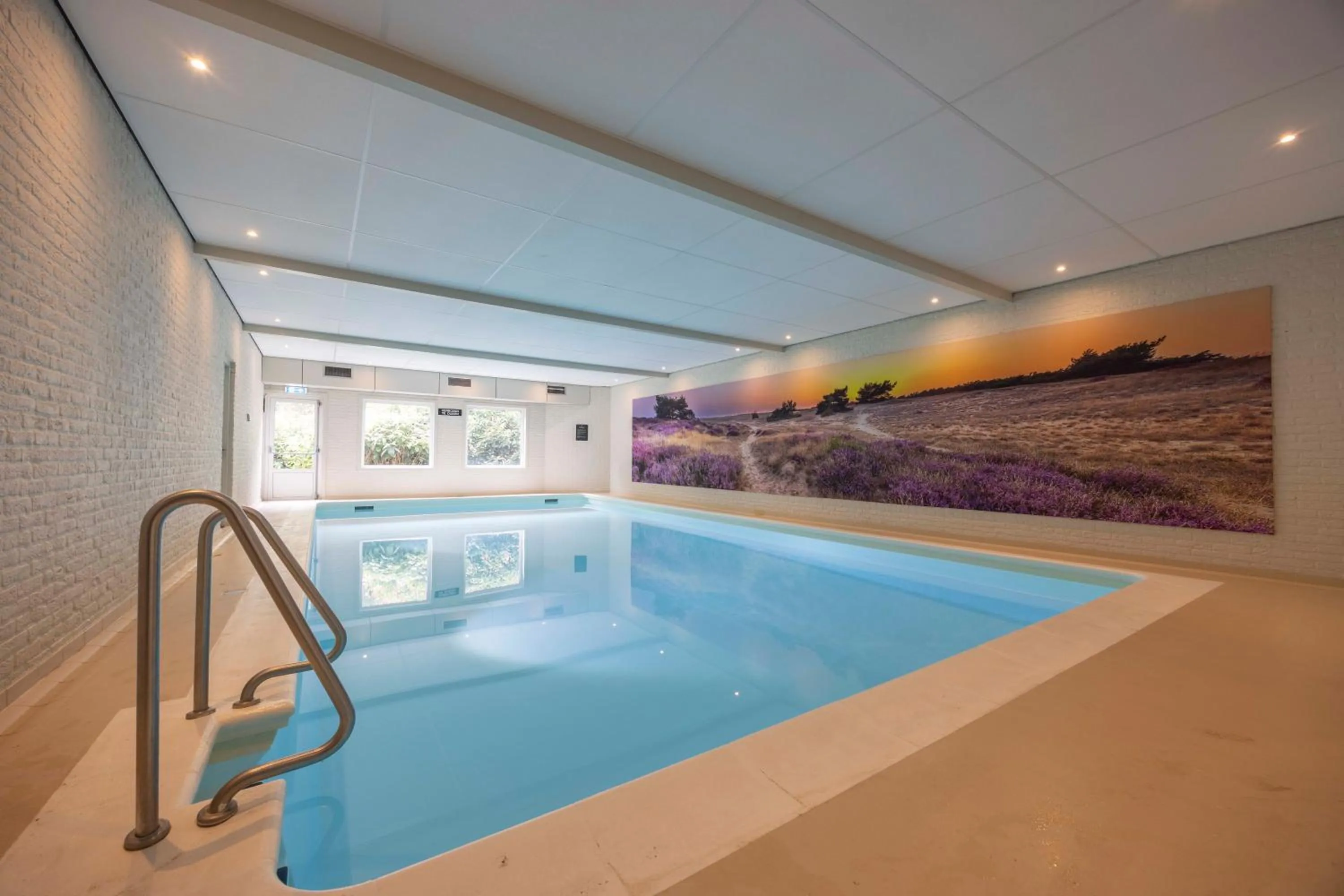 Swimming pool in Fletcher Hotel Restaurant Victoria-Hoenderloo