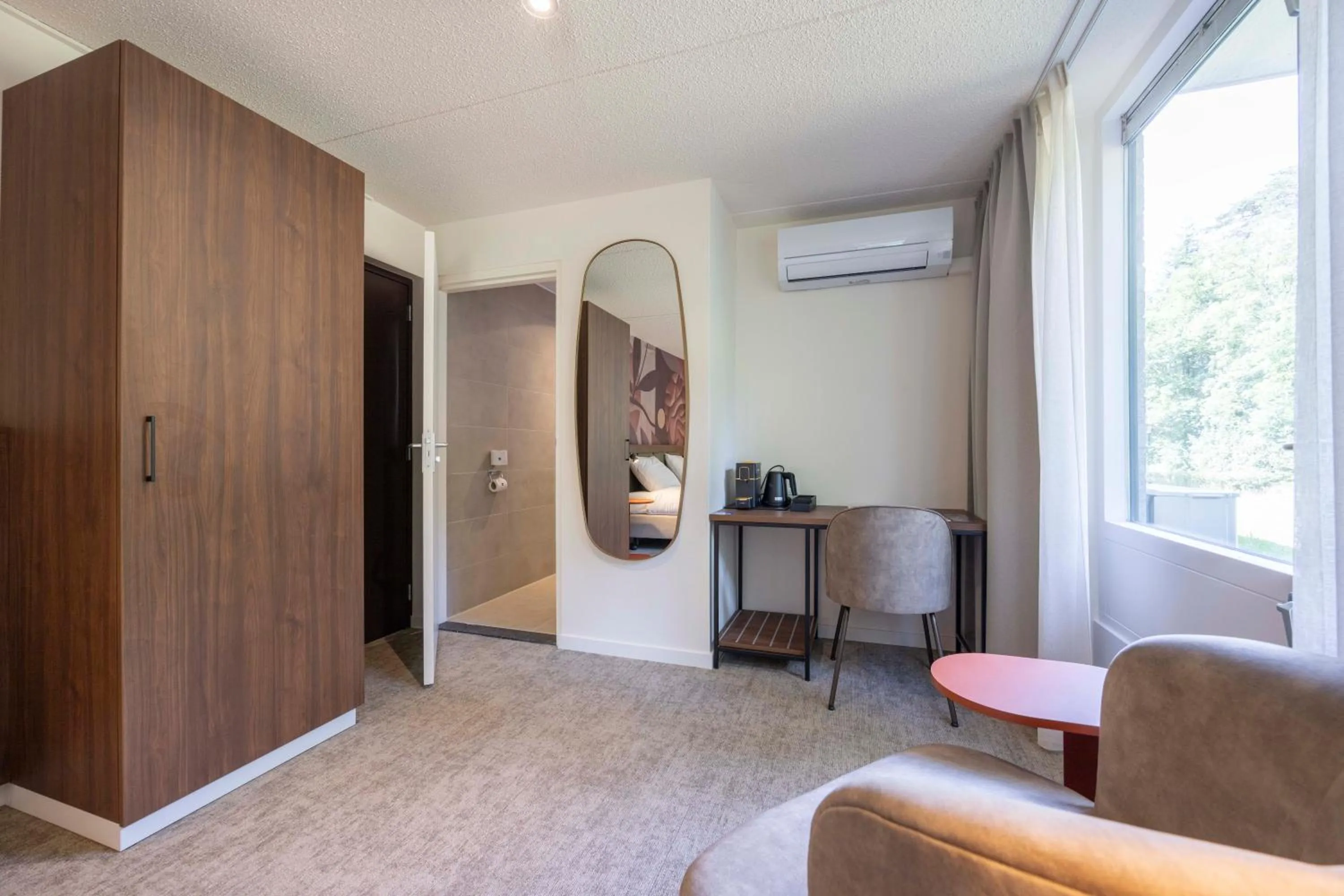 Seating area in Fletcher Hotel Restaurant Victoria-Hoenderloo