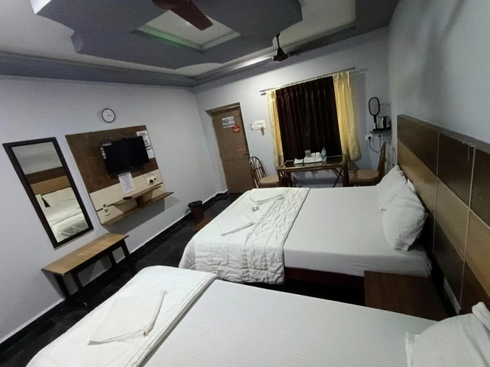 Photo of the whole room, Bed in Sri Murugan Beach Paradise Hotel