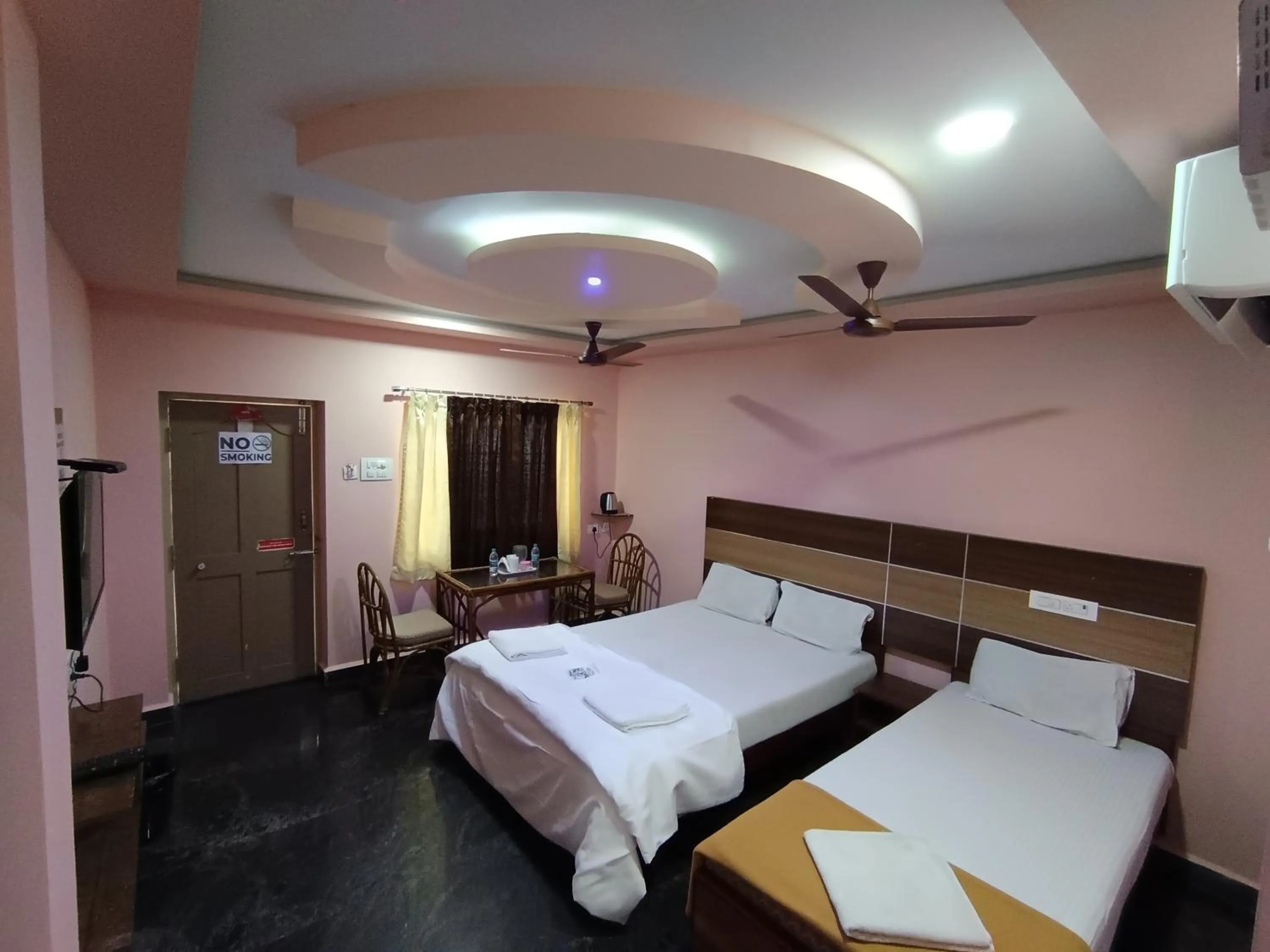 Bed in Sri Murugan Beach Paradise Hotel