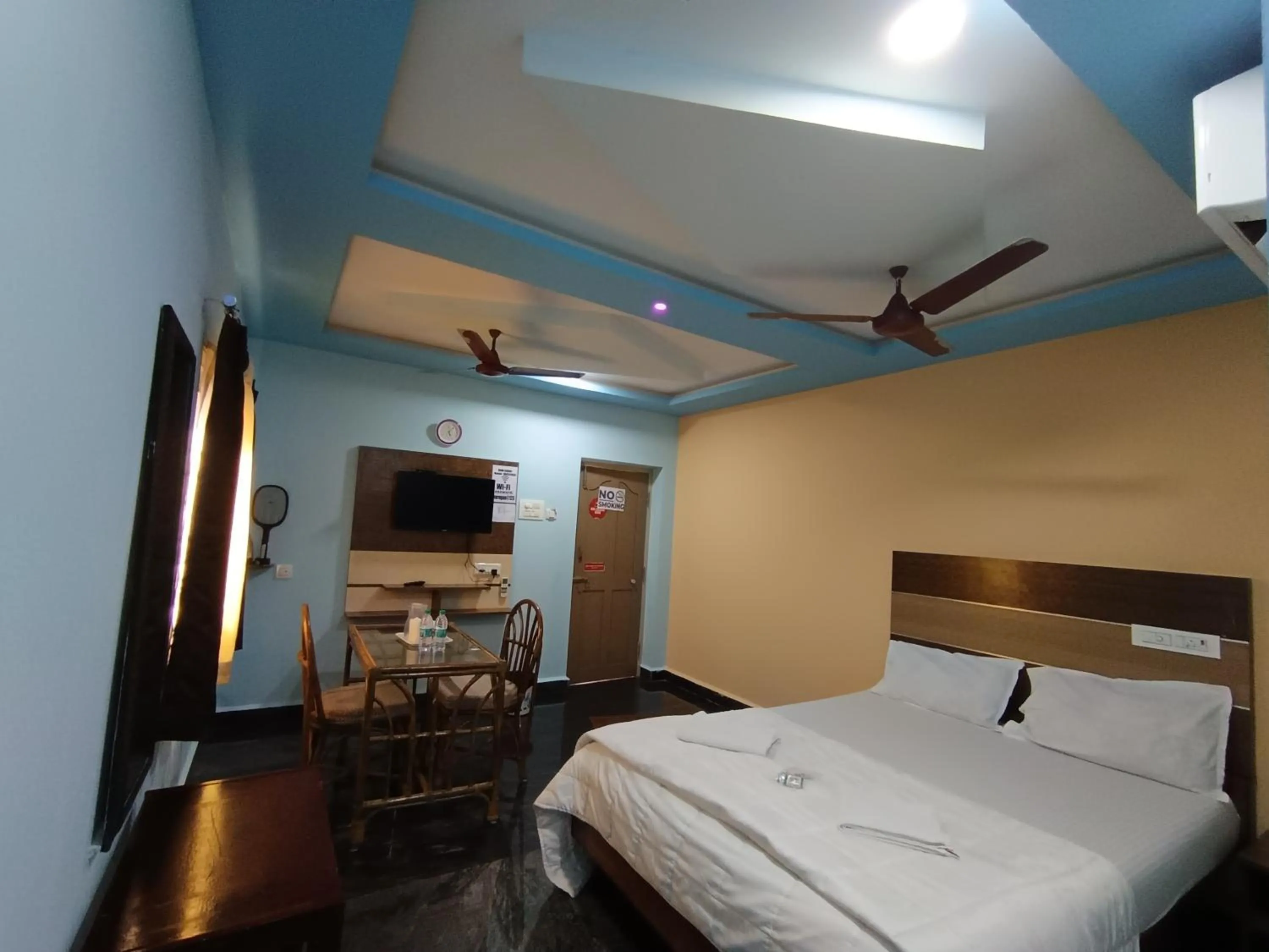 Bed in Sri Murugan Beach Paradise Hotel