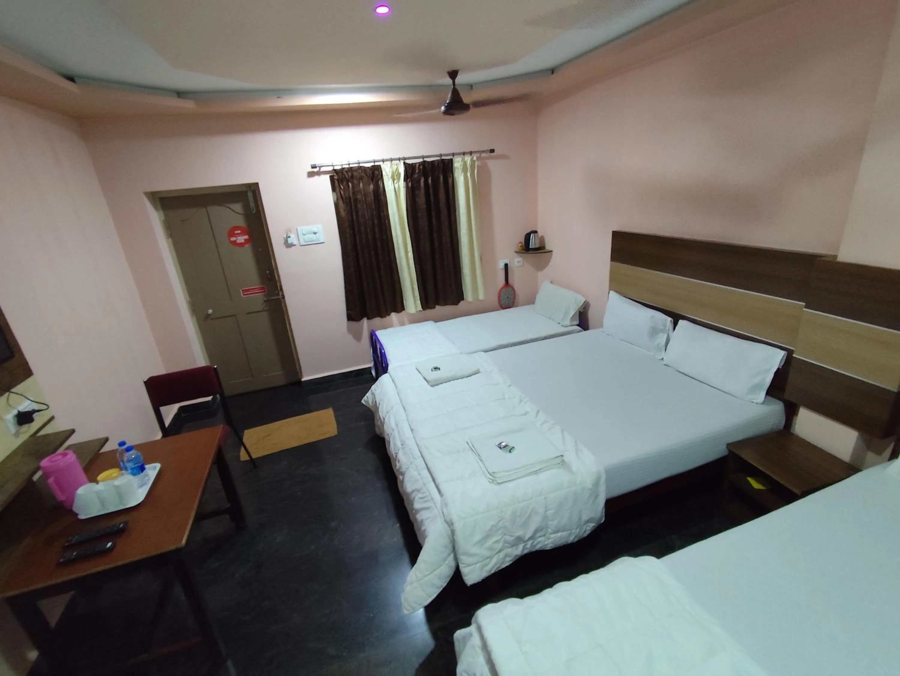 Bed in Sri Murugan Beach Paradise Hotel