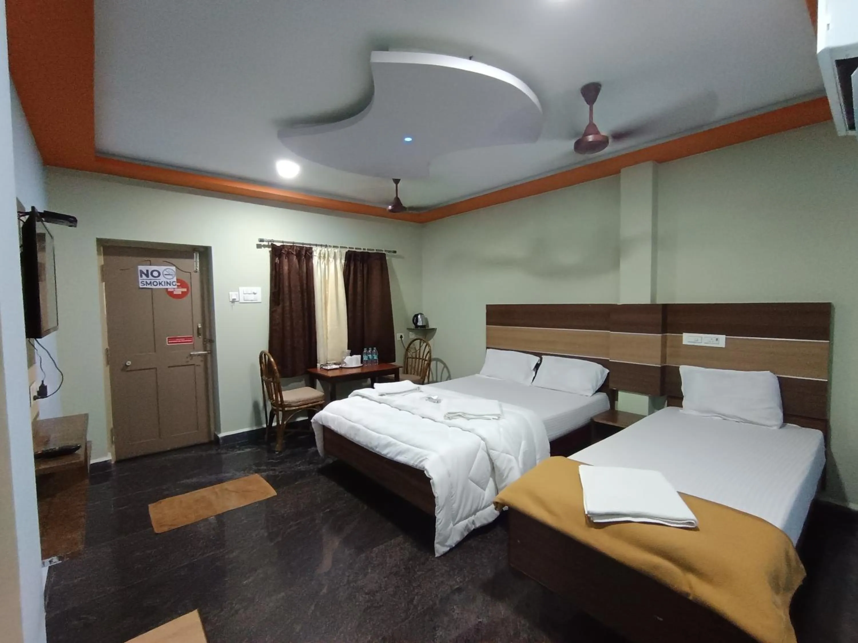 Bed in Sri Murugan Beach Paradise Hotel