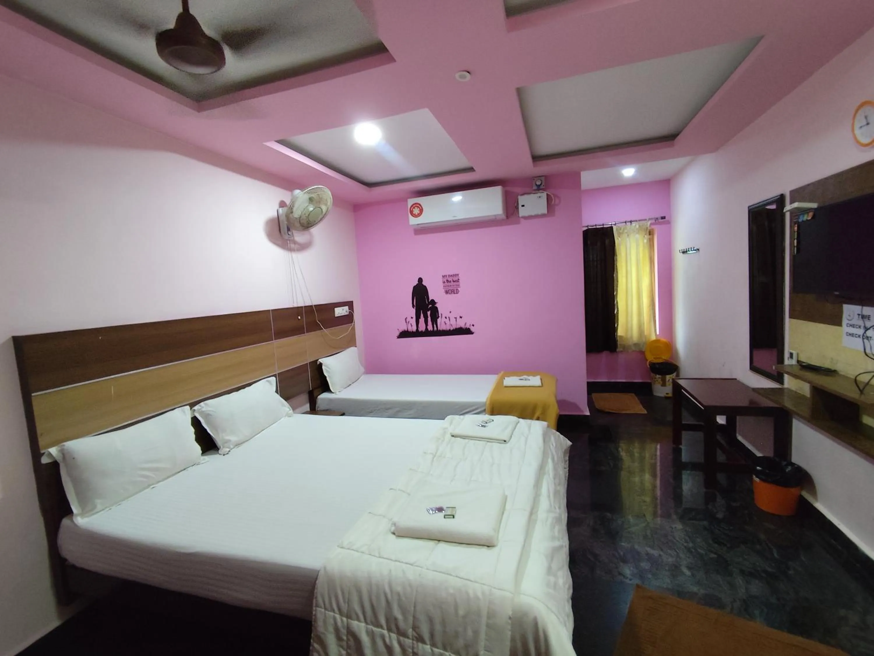 Photo of the whole room, Bed in Sri Murugan Beach Paradise Hotel