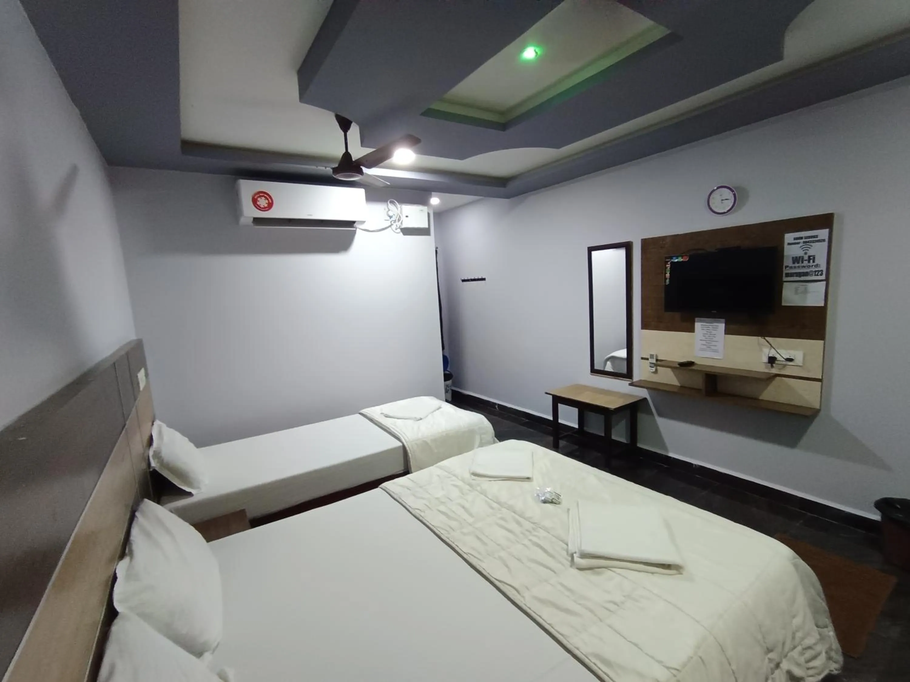 Bed in Sri Murugan Beach Paradise Hotel