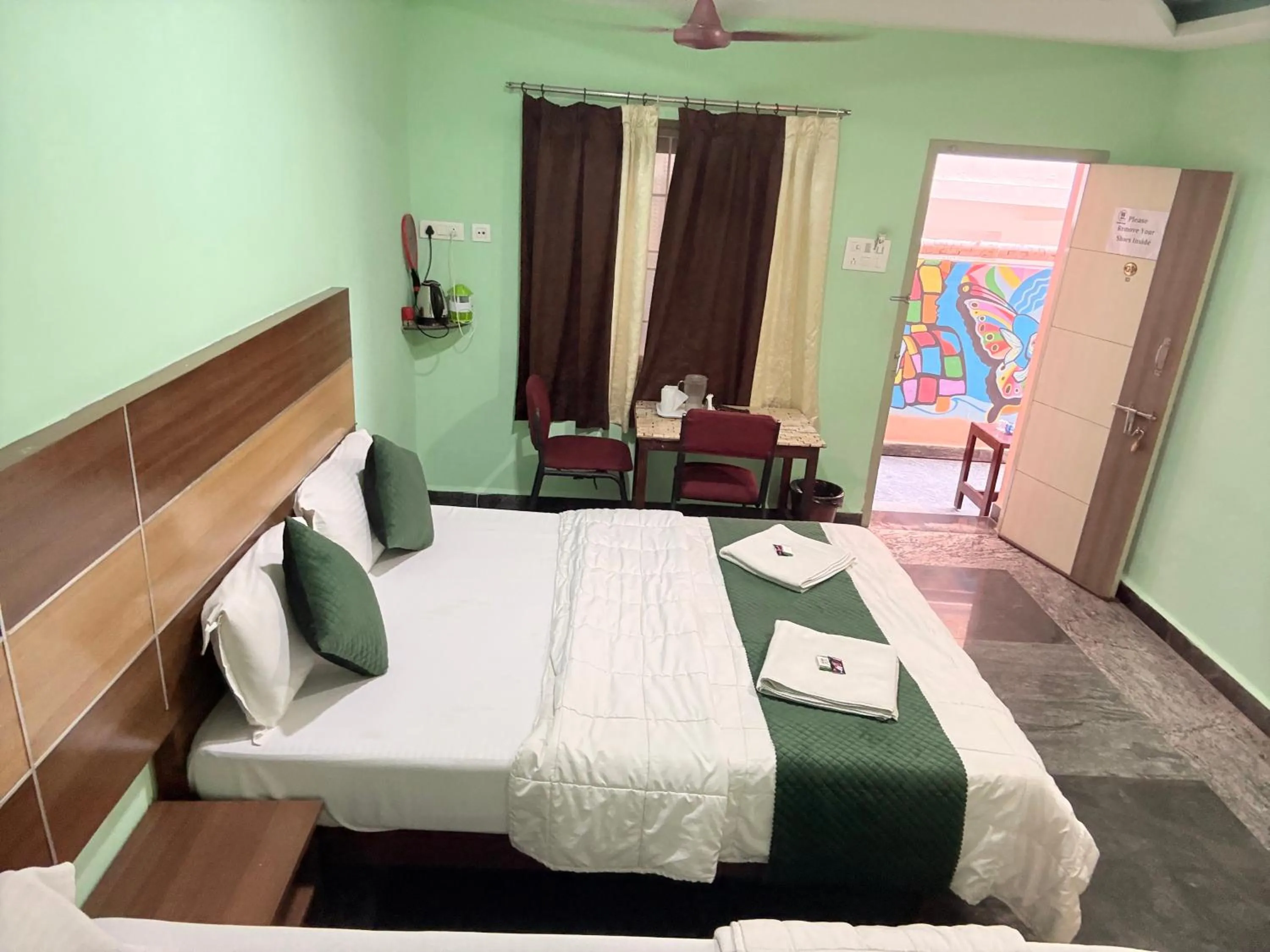 Bed in Sri Murugan Beach Paradise Hotel