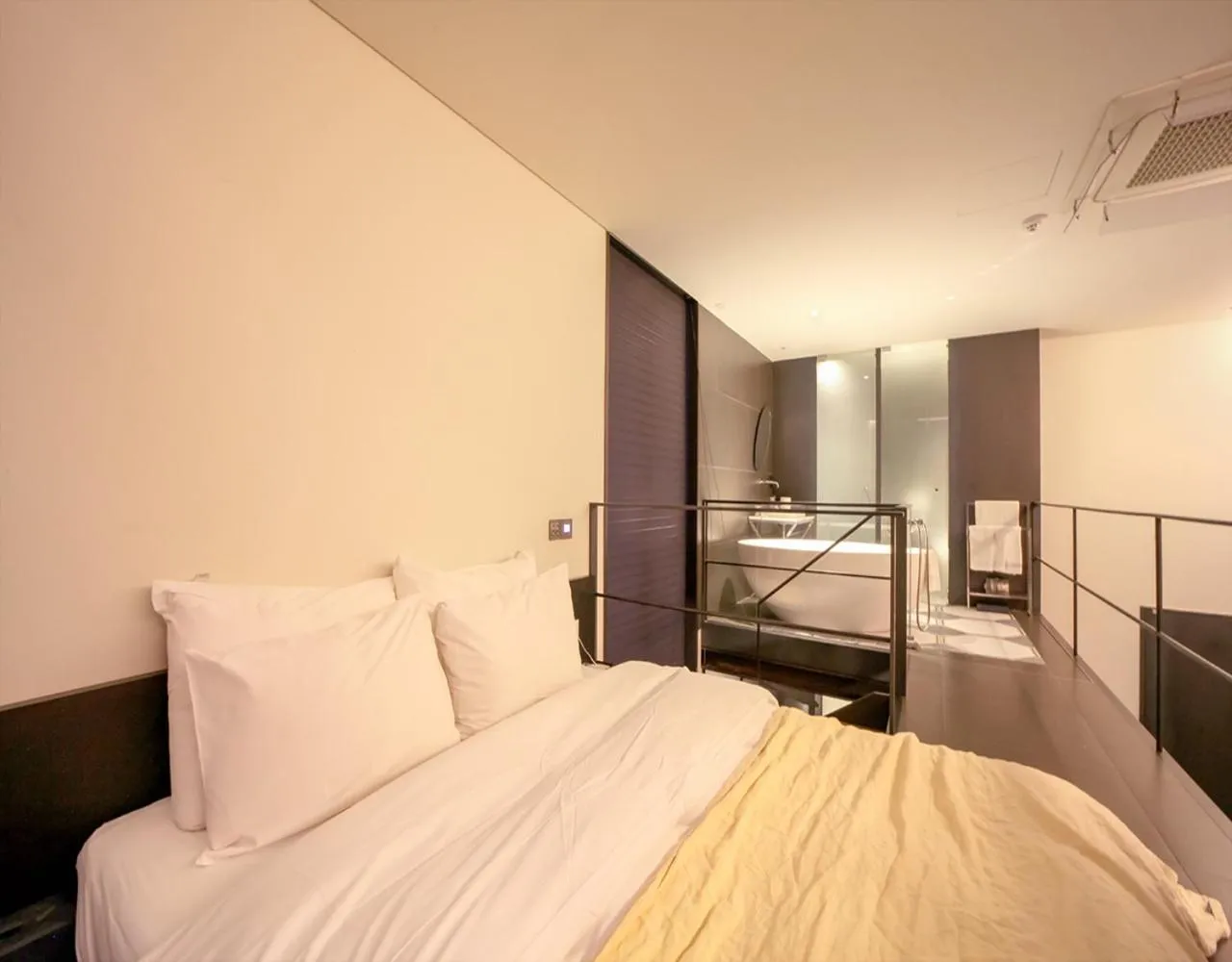 Bed in JS Boutique Hotel