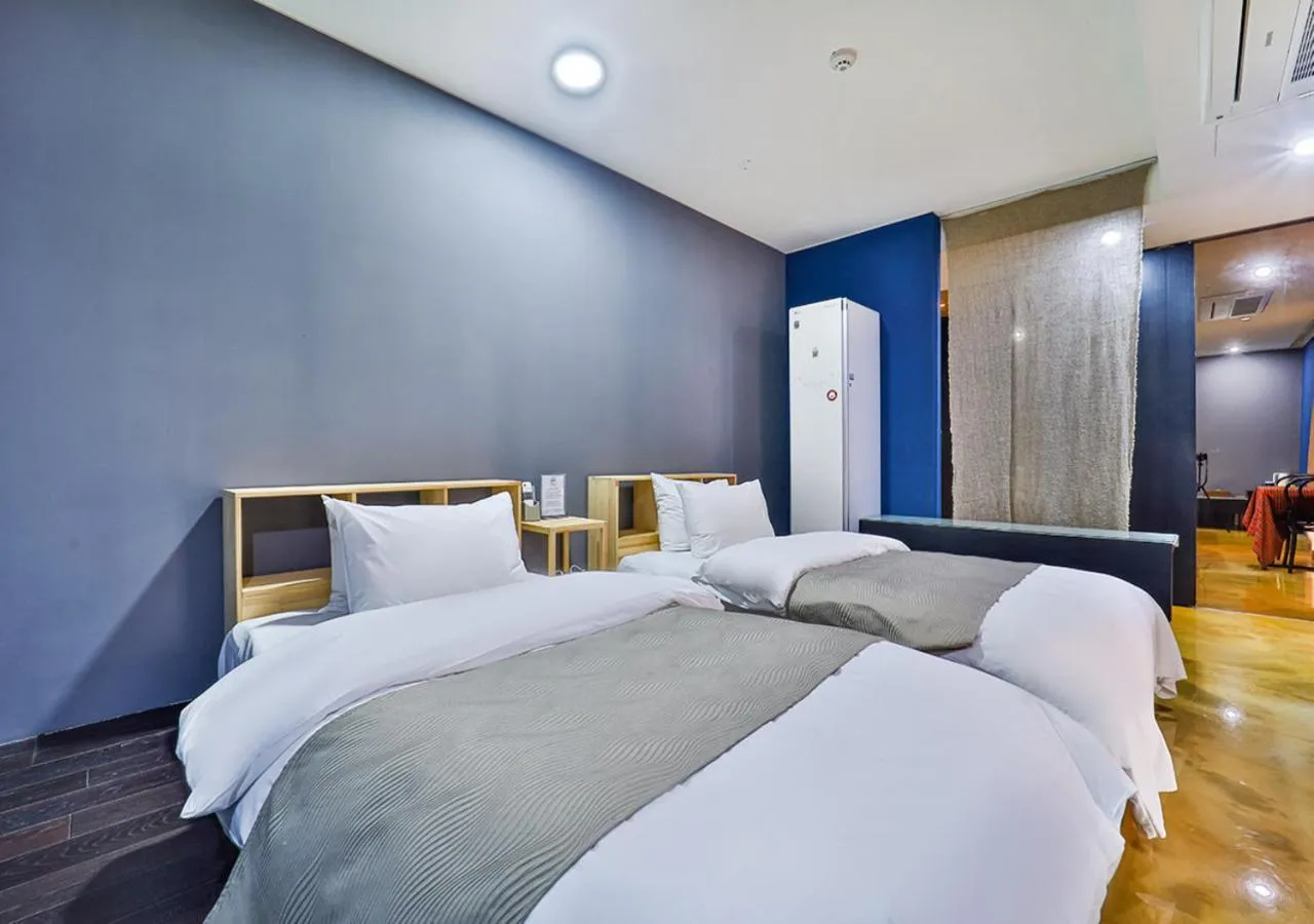 Bed in JS Boutique Hotel