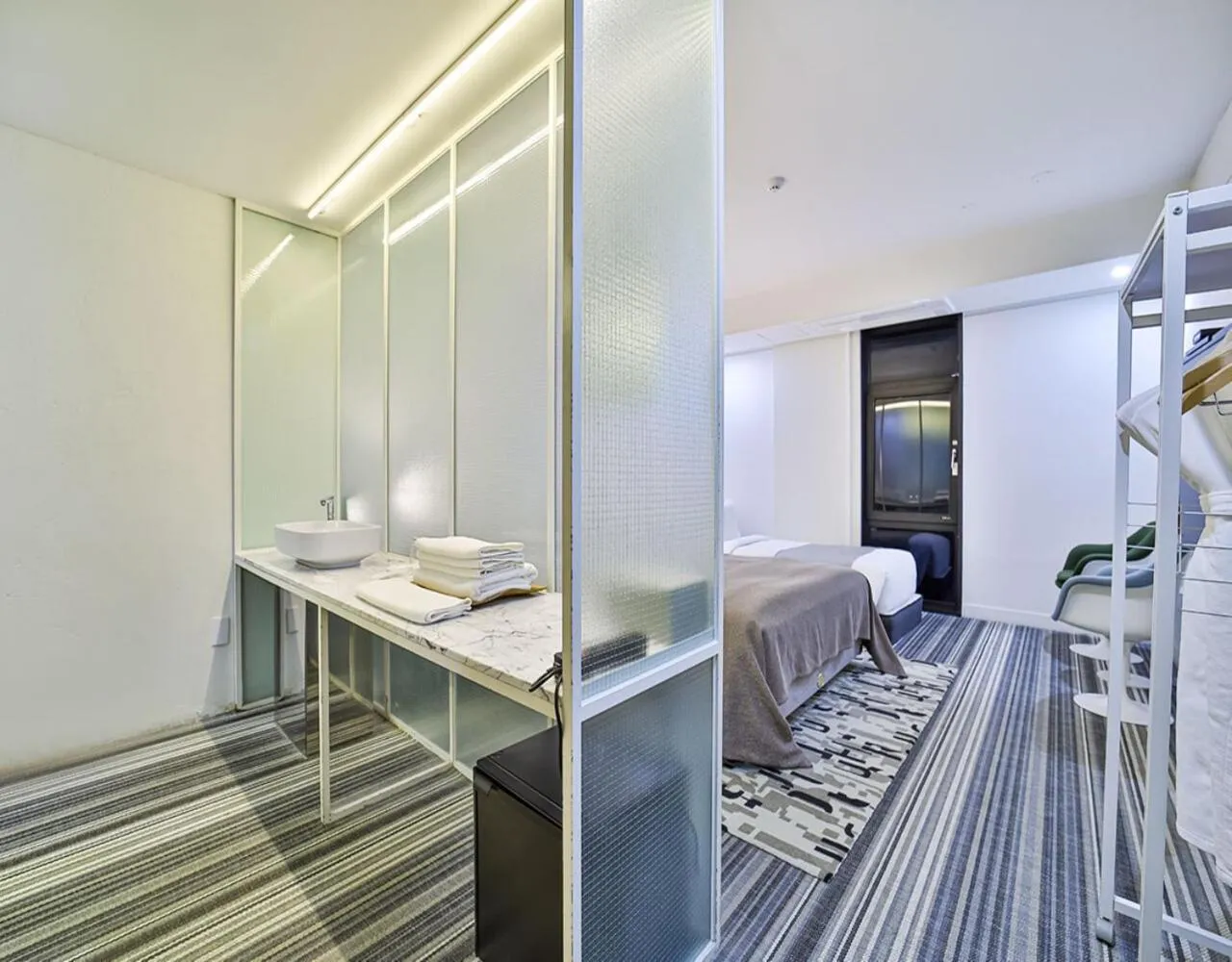 Bed in JS Boutique Hotel