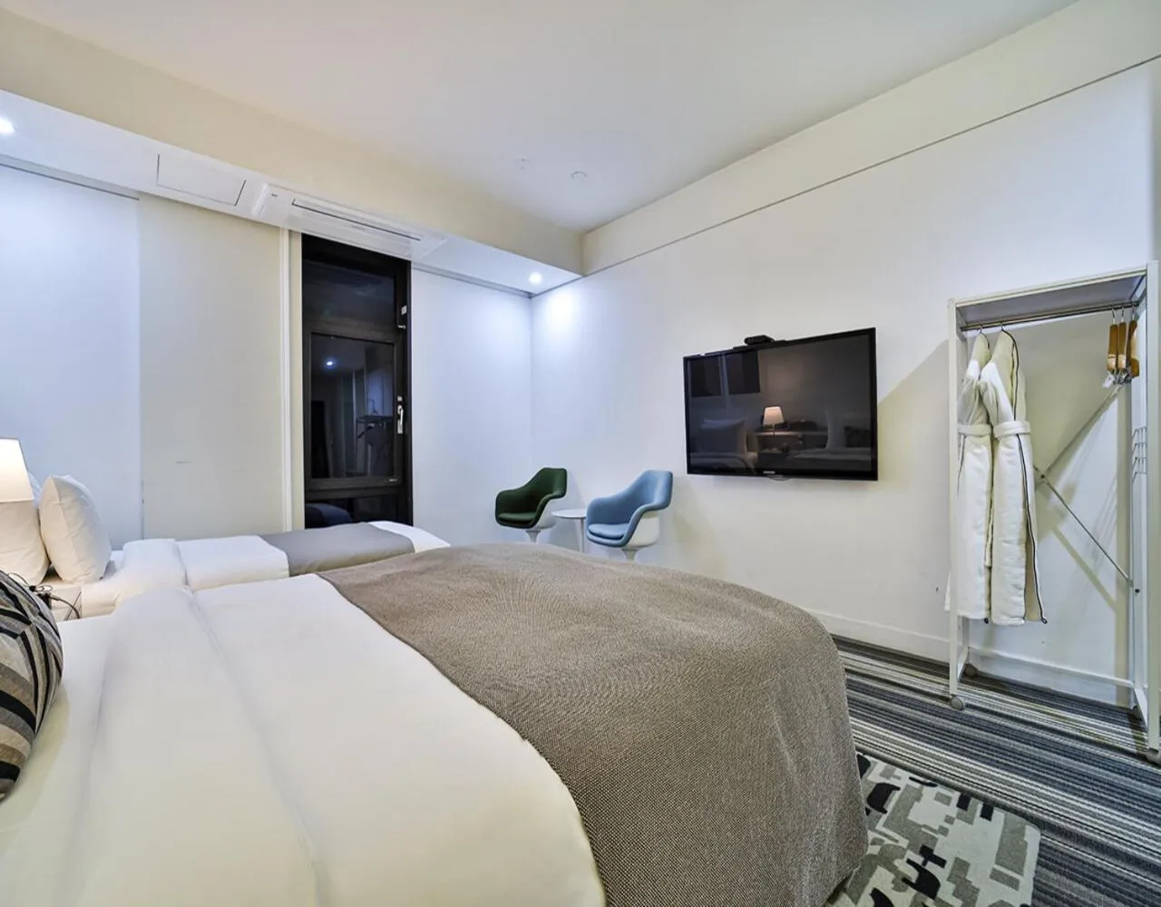 Bed in JS Boutique Hotel