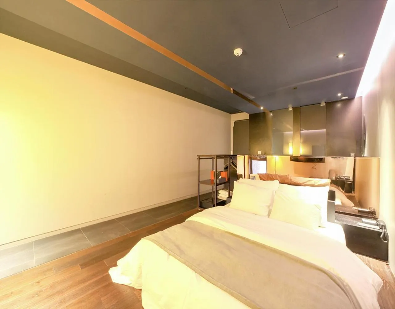 Bed in JS Boutique Hotel