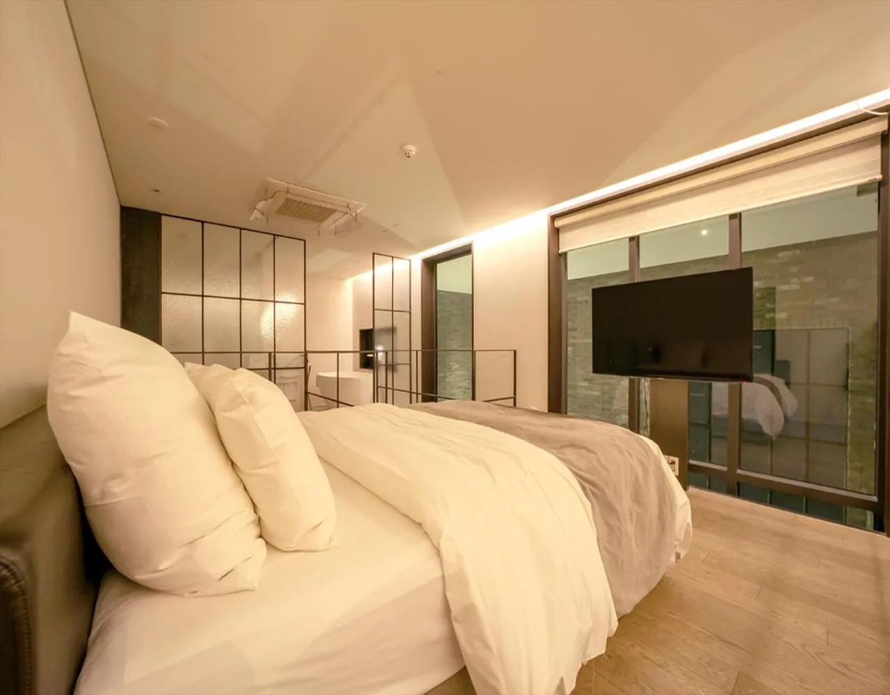 Bed in JS Boutique Hotel
