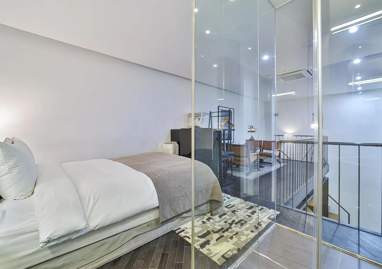 Bed in JS Boutique Hotel