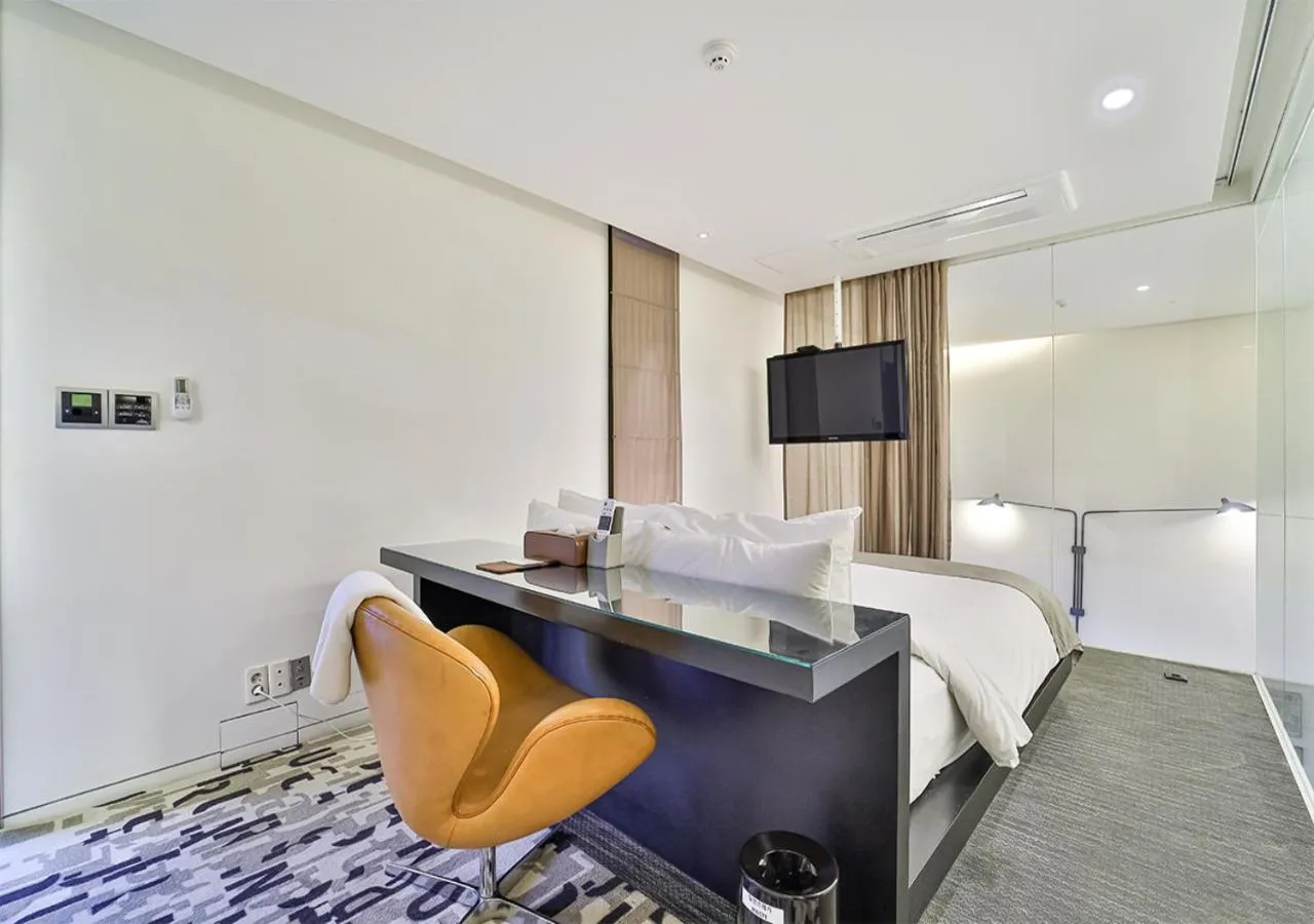 Bed in JS Boutique Hotel