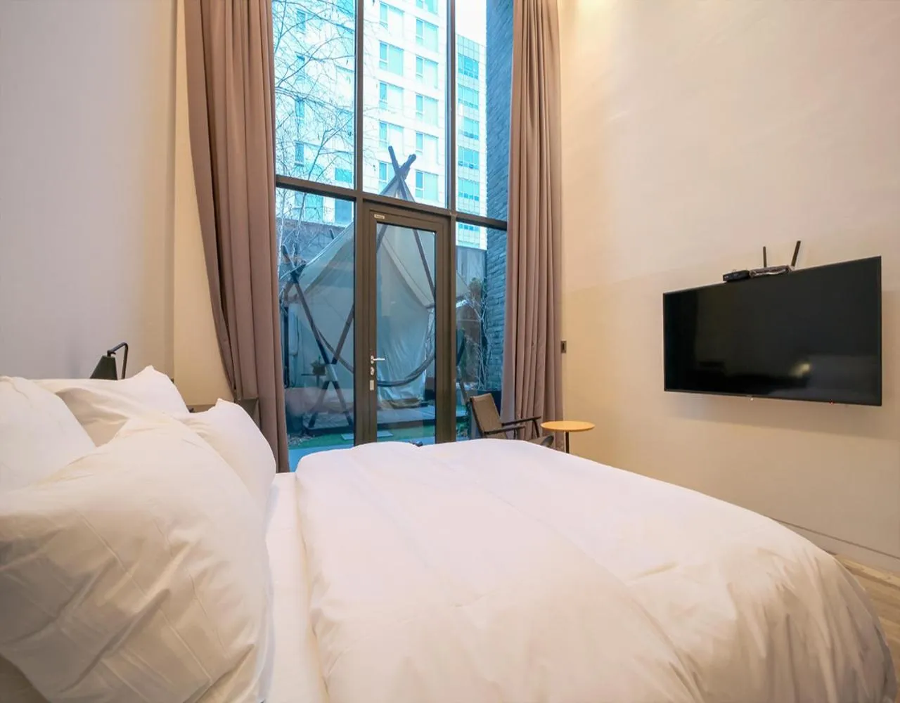 Bed in JS Boutique Hotel