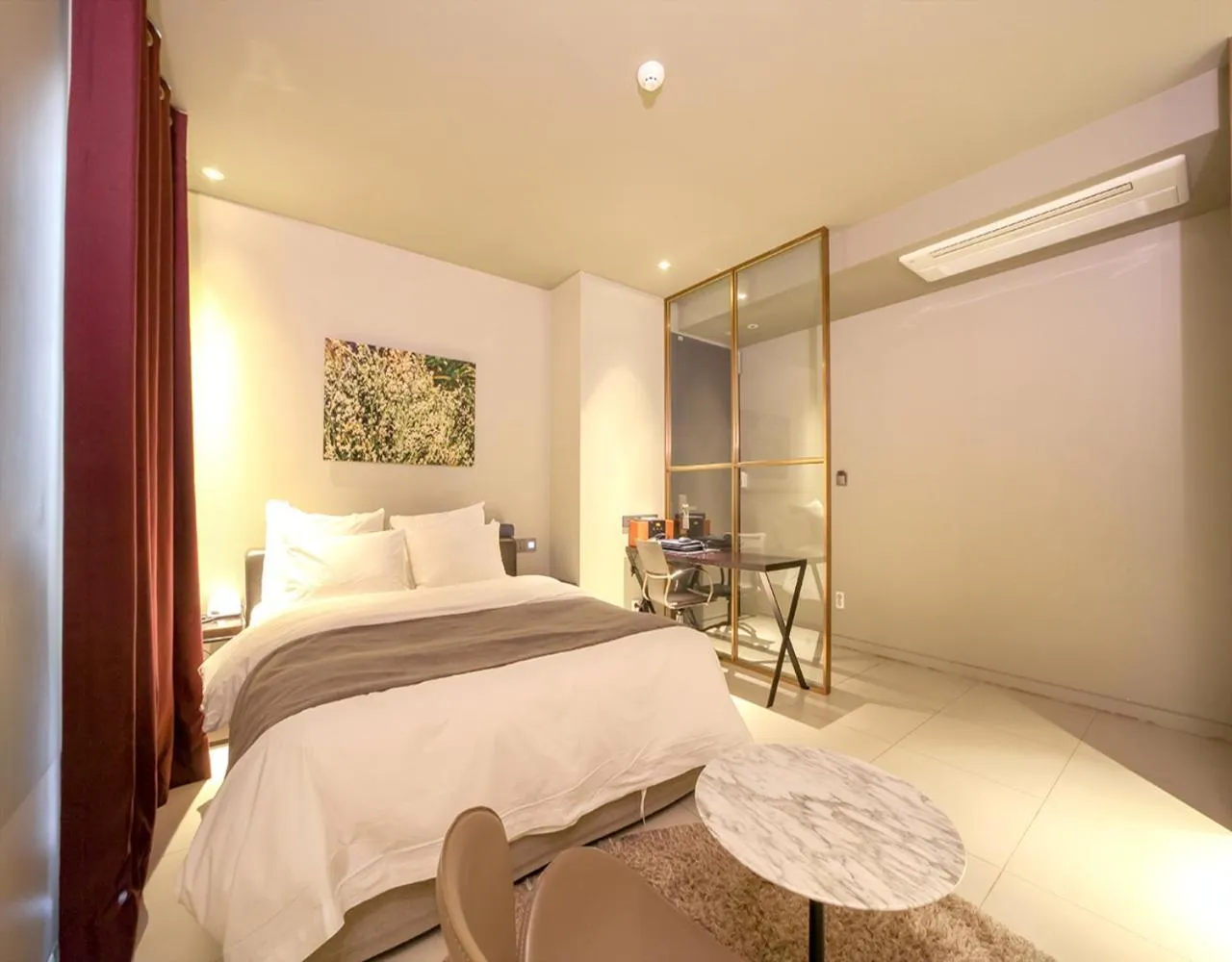 Bed in JS Boutique Hotel