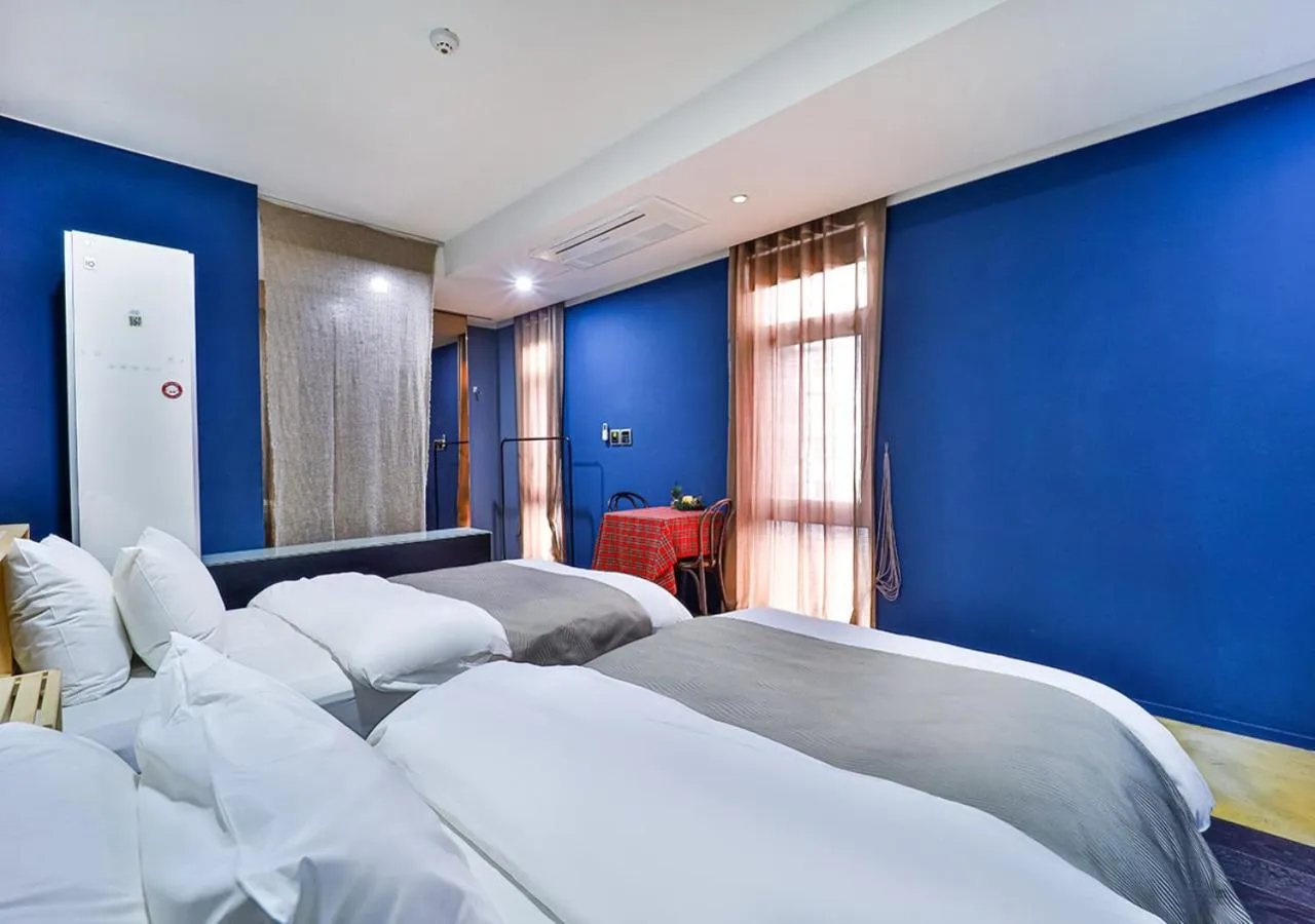 Bed in JS Boutique Hotel
