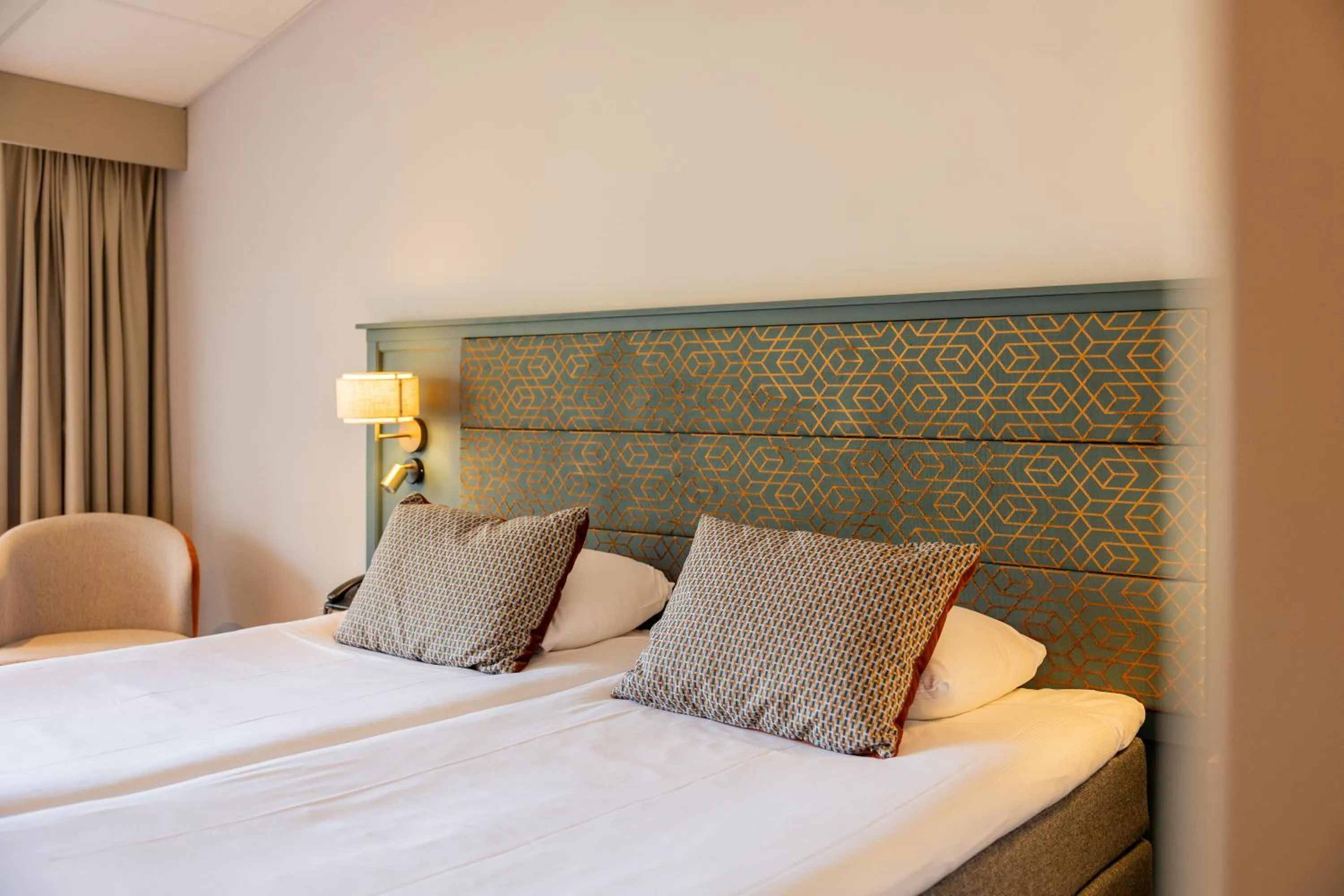 Bed in Parkhotel Tjaarda