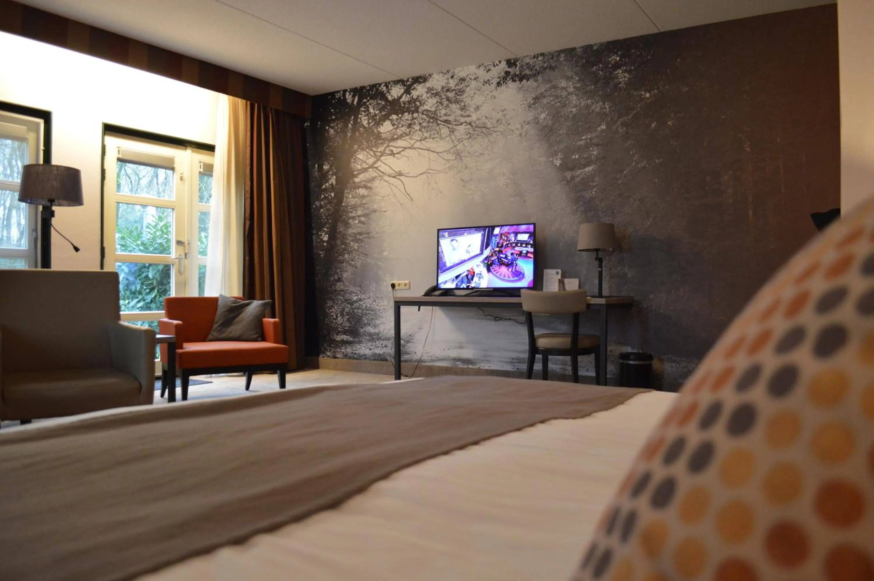 Bed in Parkhotel Tjaarda