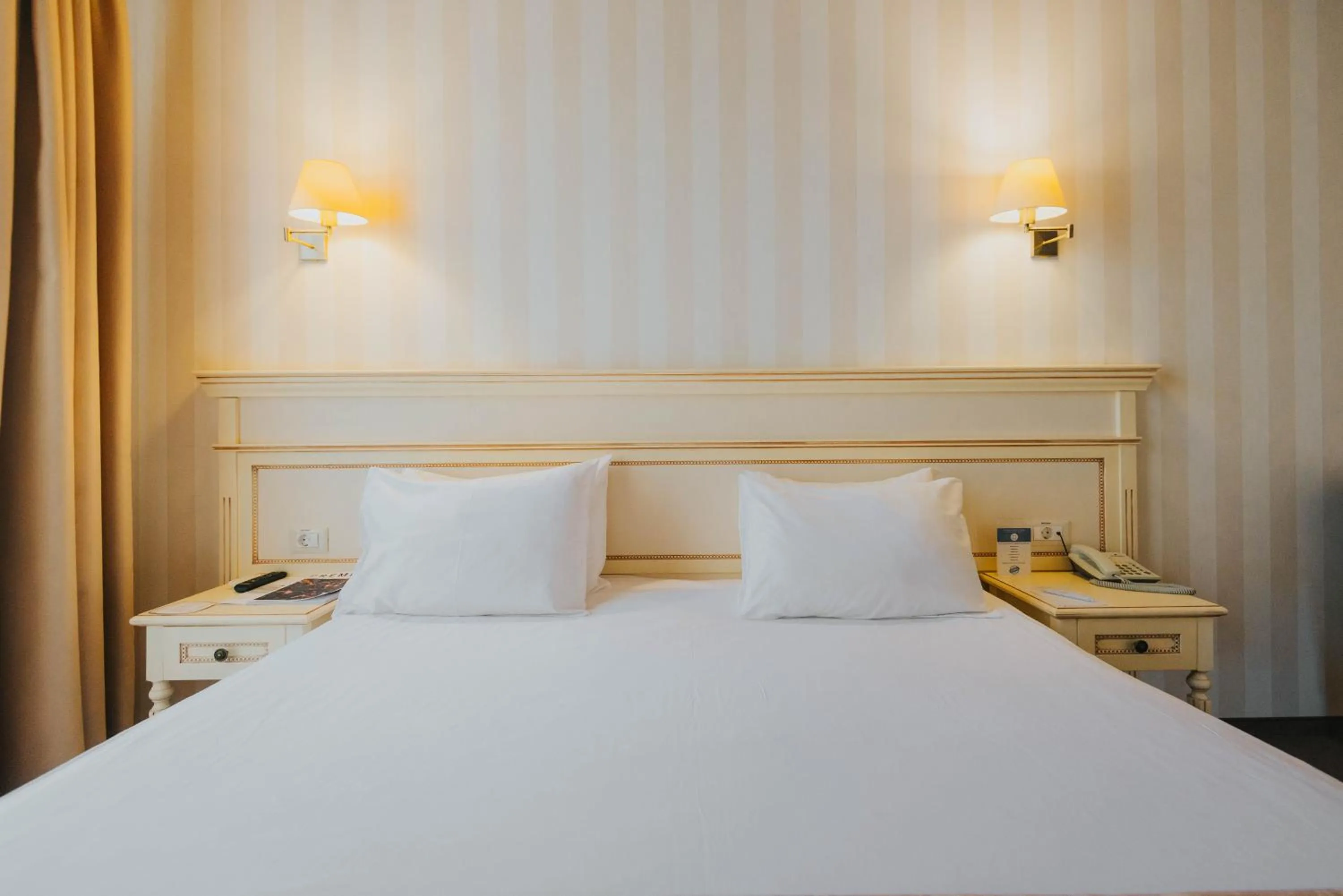 Bed in Premier Geneva Hotel