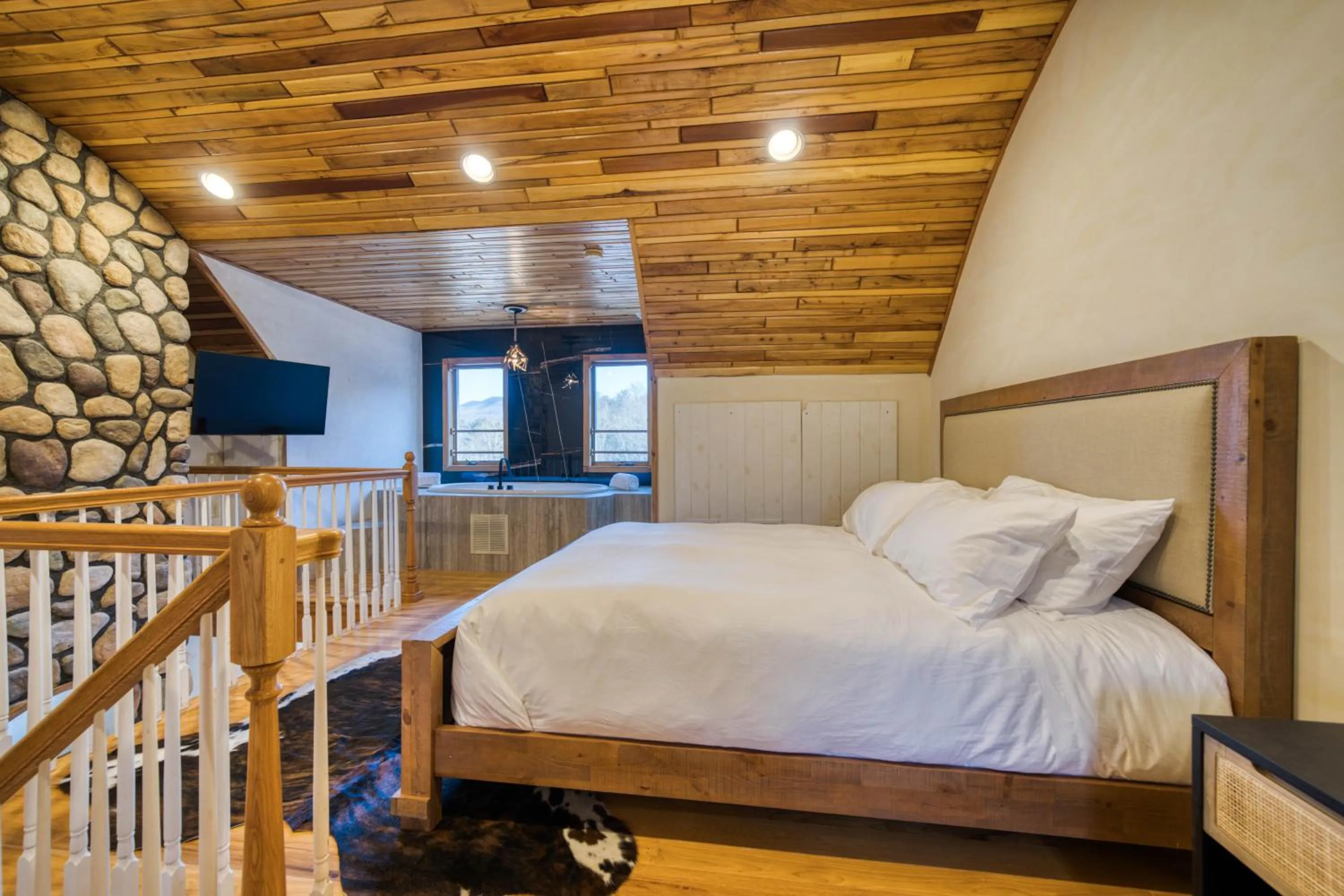 Photo of the whole room, Bed in The Haüs Windham - Spacious Suites, Hot Tub, Mountain Views!