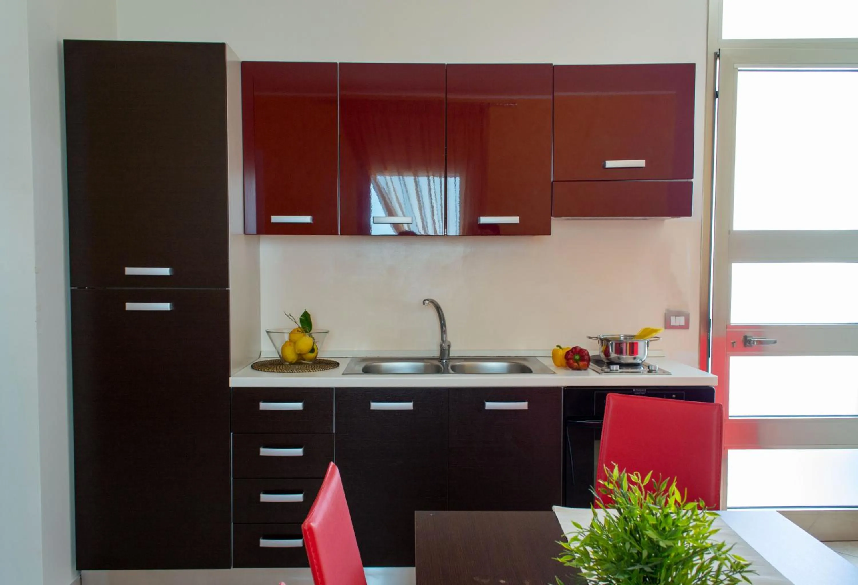Kitchen or kitchenette in Residence Borgo & Mare - Localo