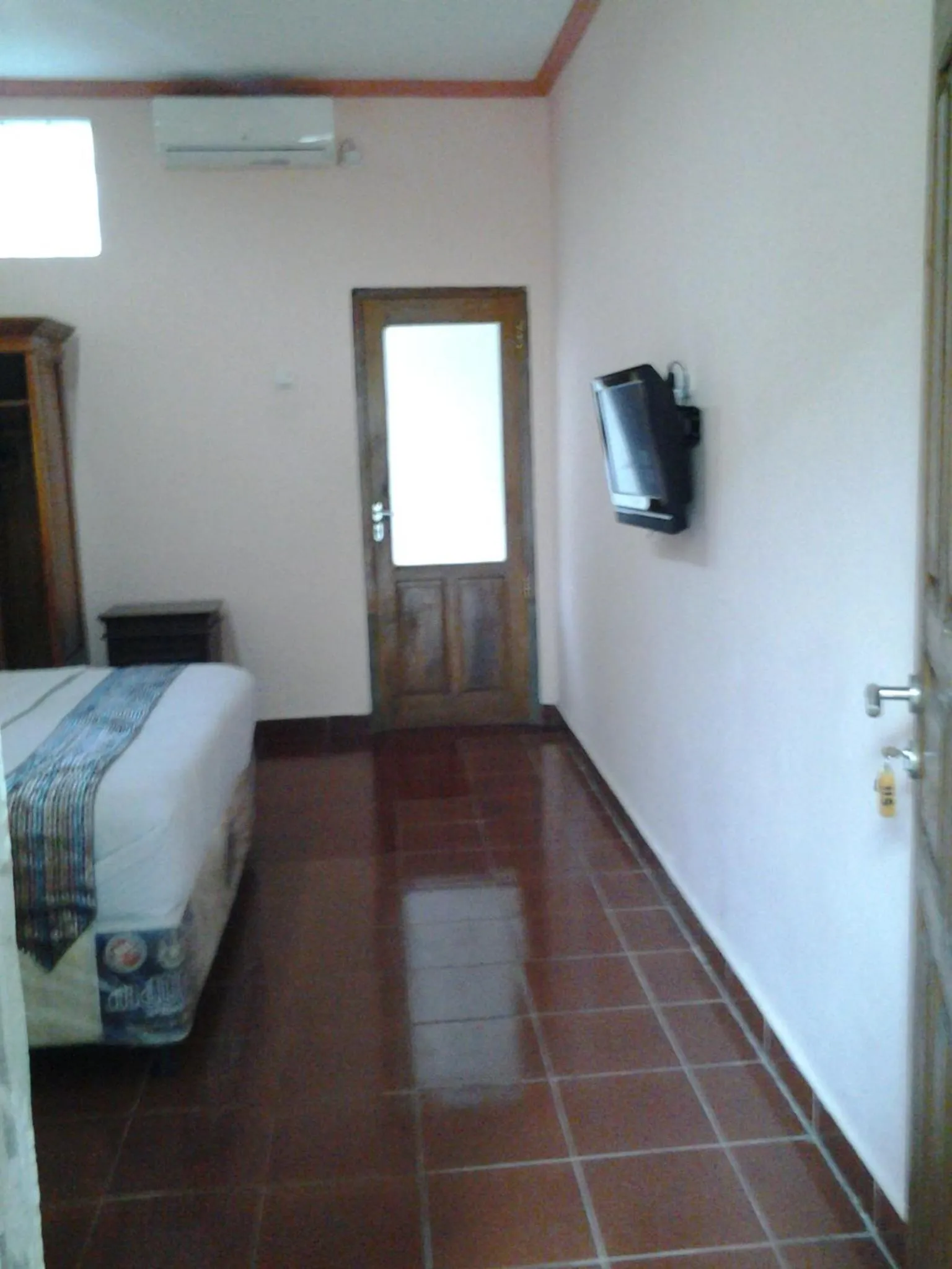 Photo of the whole room, Bed in Mahendra Beach Inn