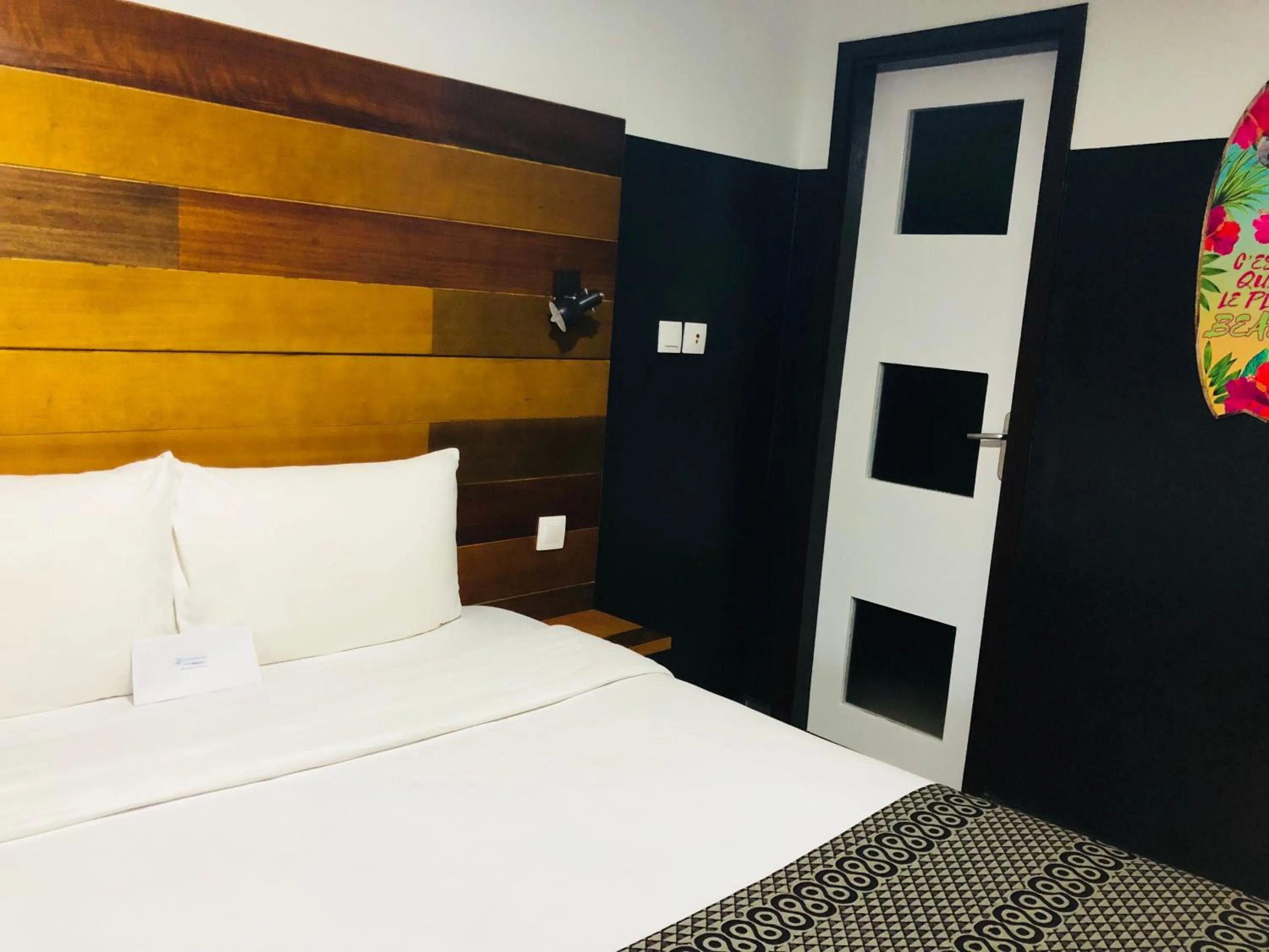 Bed in Détente Hôtel