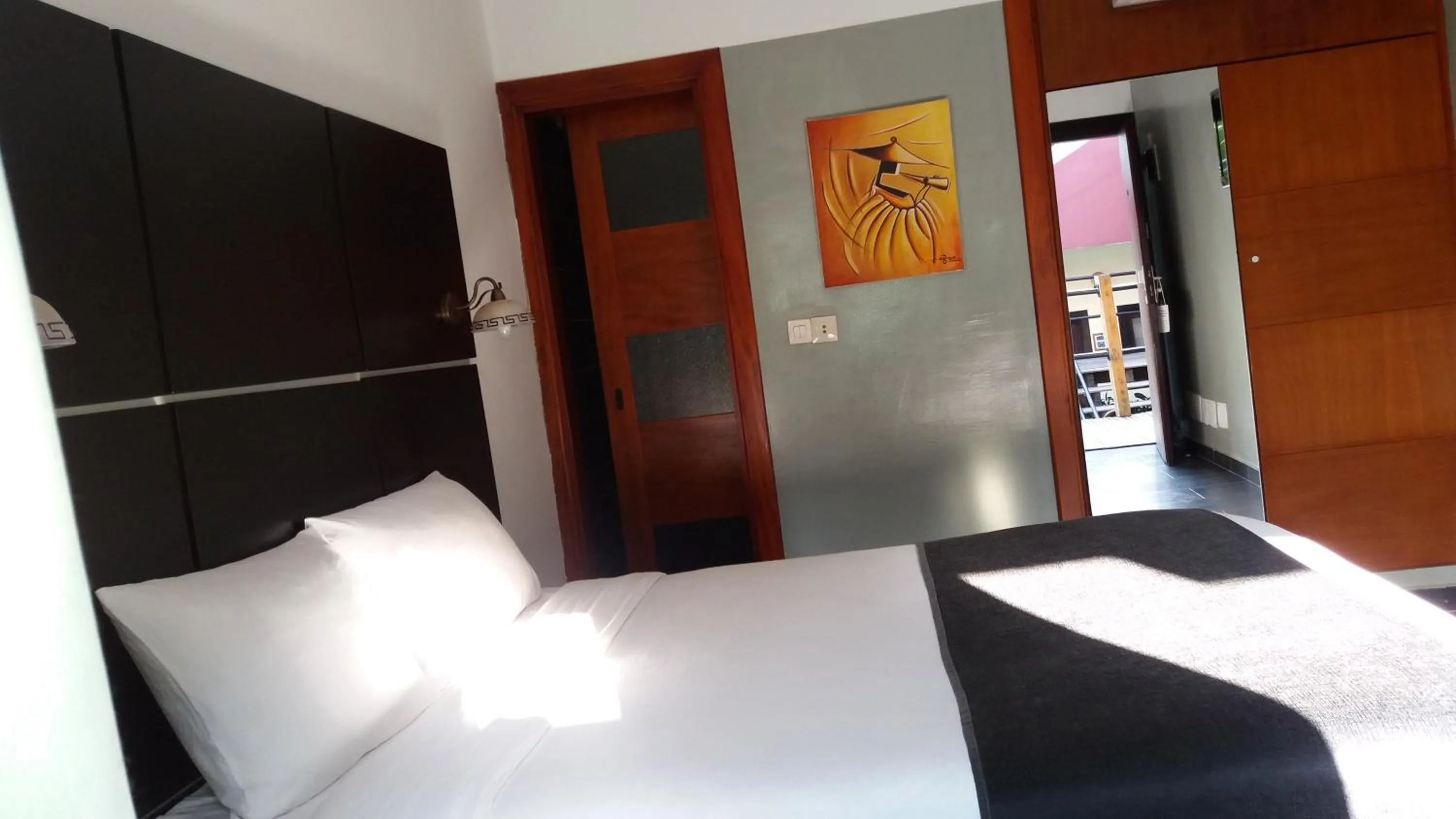 Photo of the whole room, Bed in Détente Hôtel