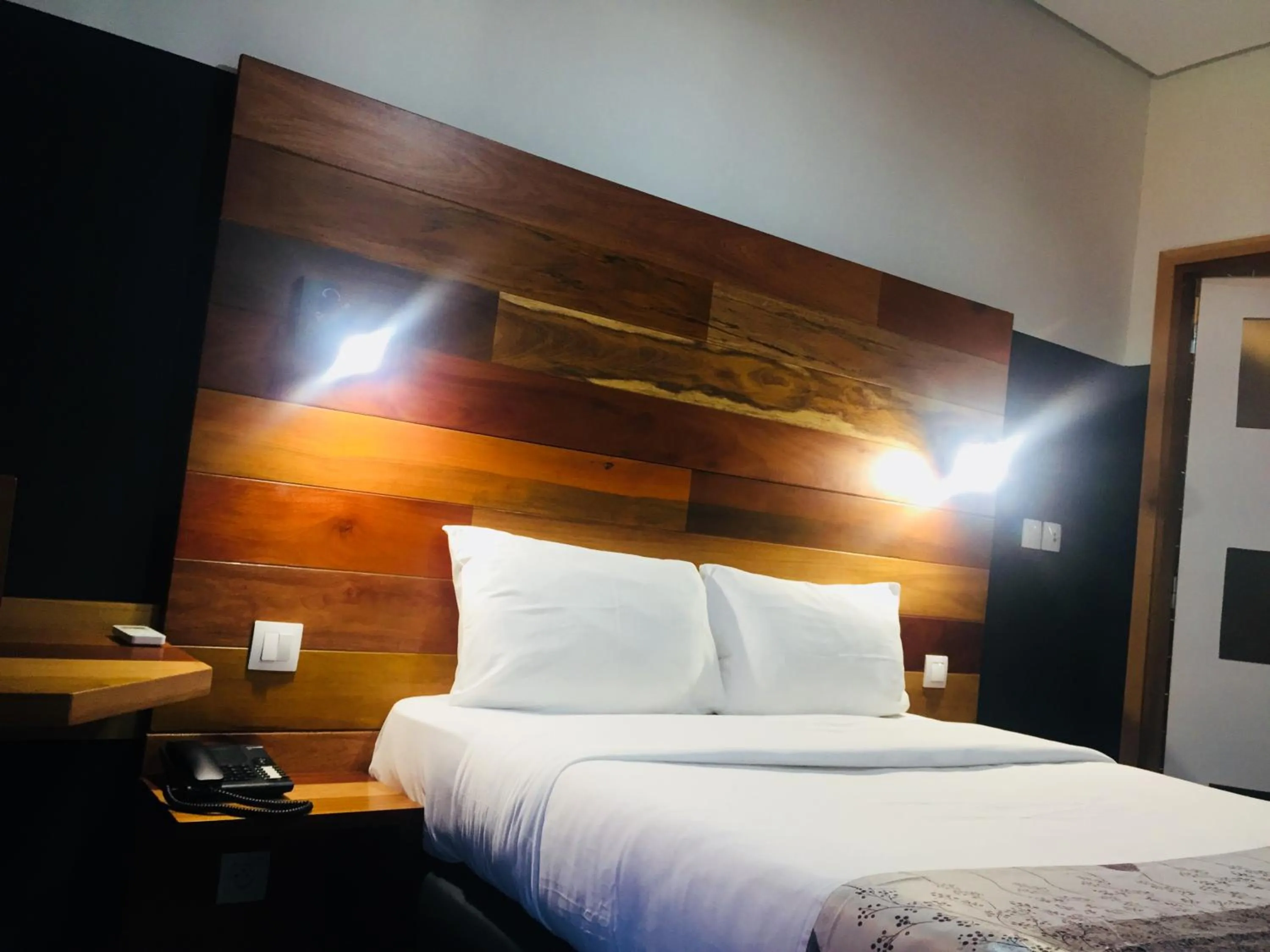 Bed in Détente Hôtel