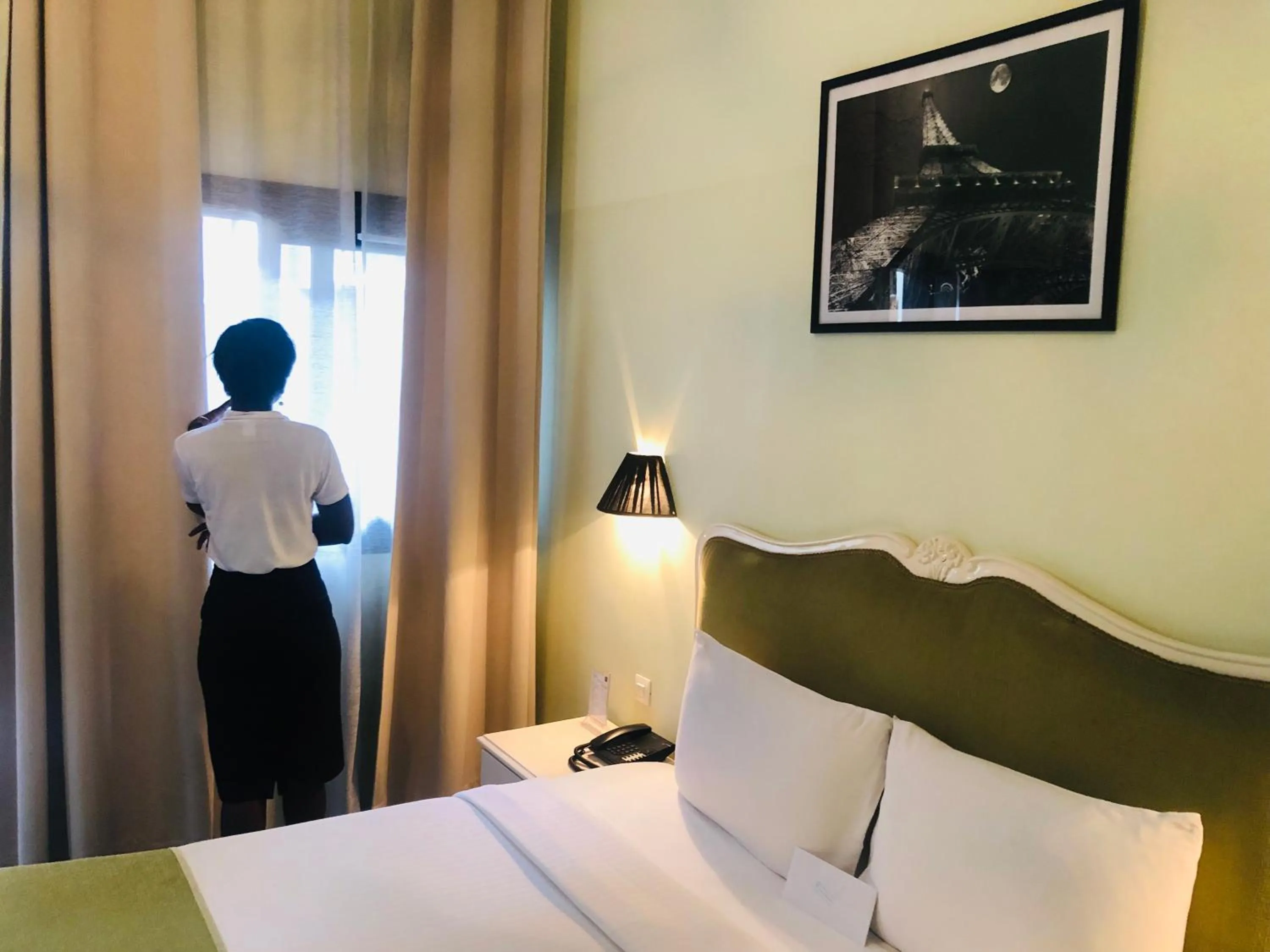 Photo of the whole room, Bed in Détente Hôtel