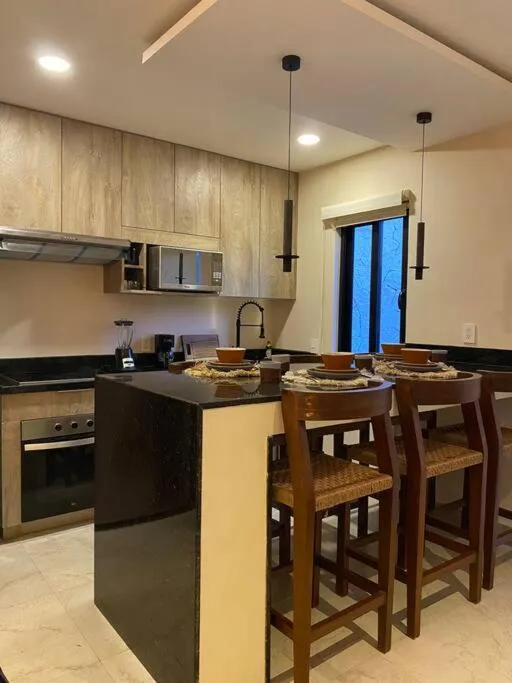 Kitchen/Kitchenette in Cacao Tulum departamentos