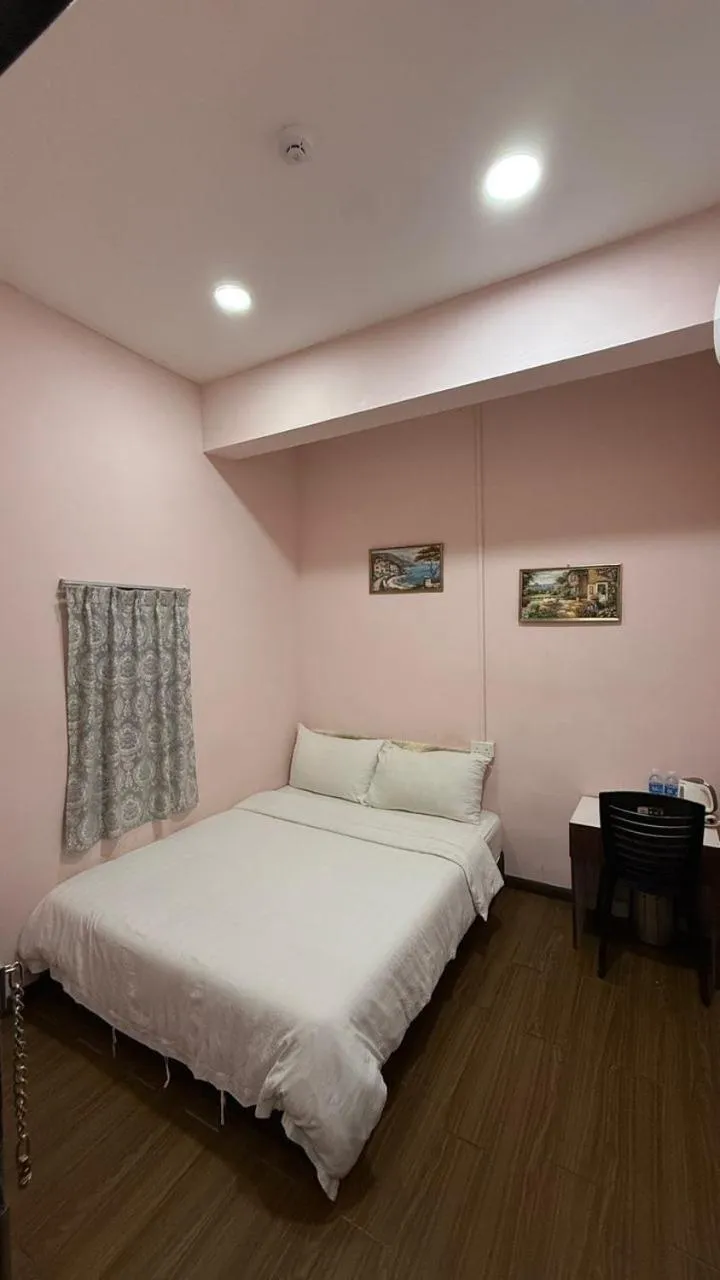 Bed in Sipadan Crystal Haven Inn