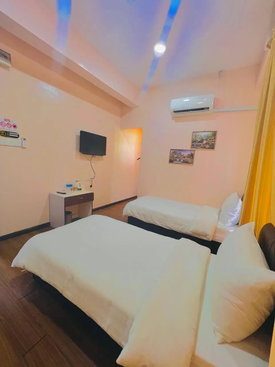 Bed in Sipadan Crystal Haven Inn