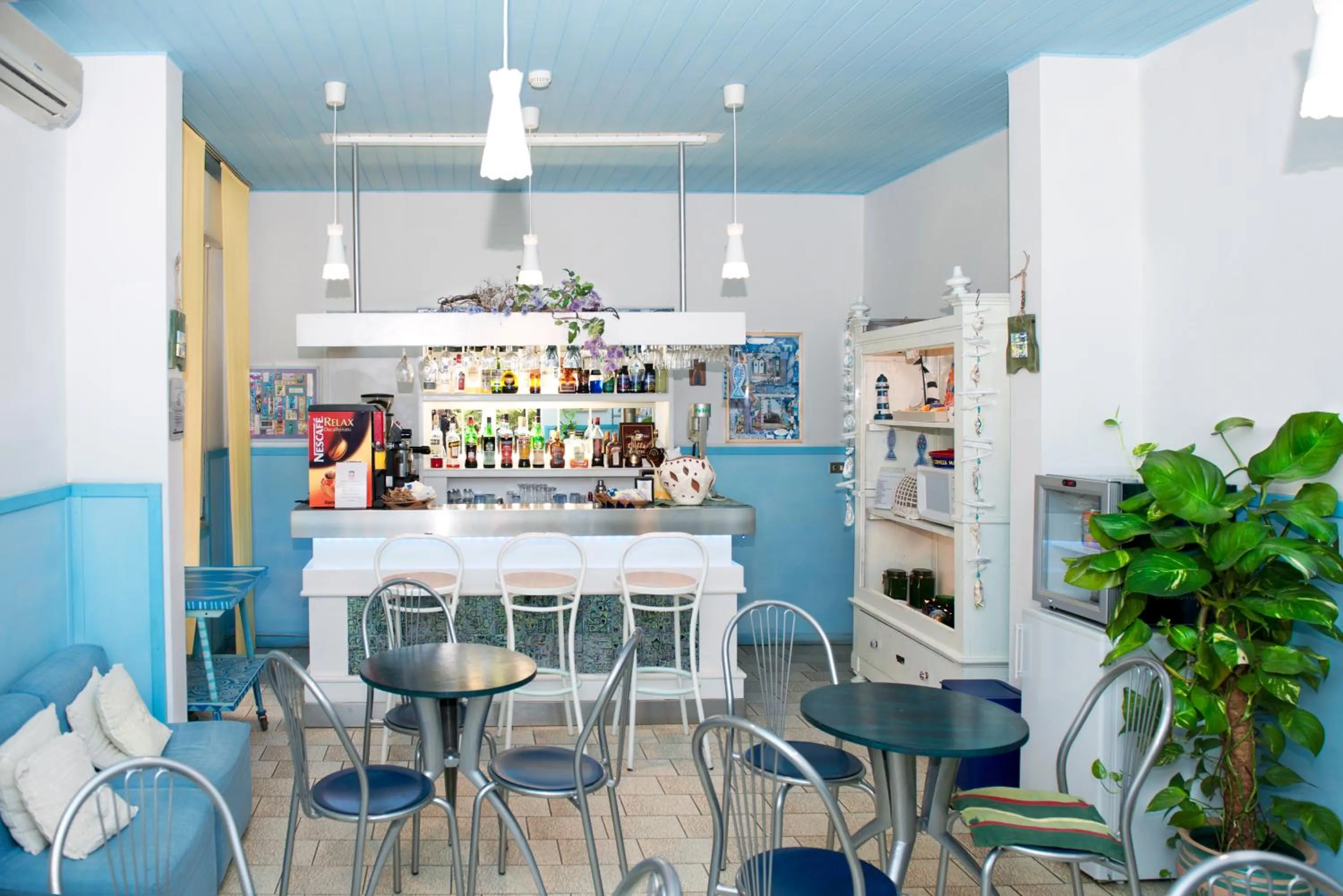 Communal lounge/ TV room in Hotel Villa Rosa