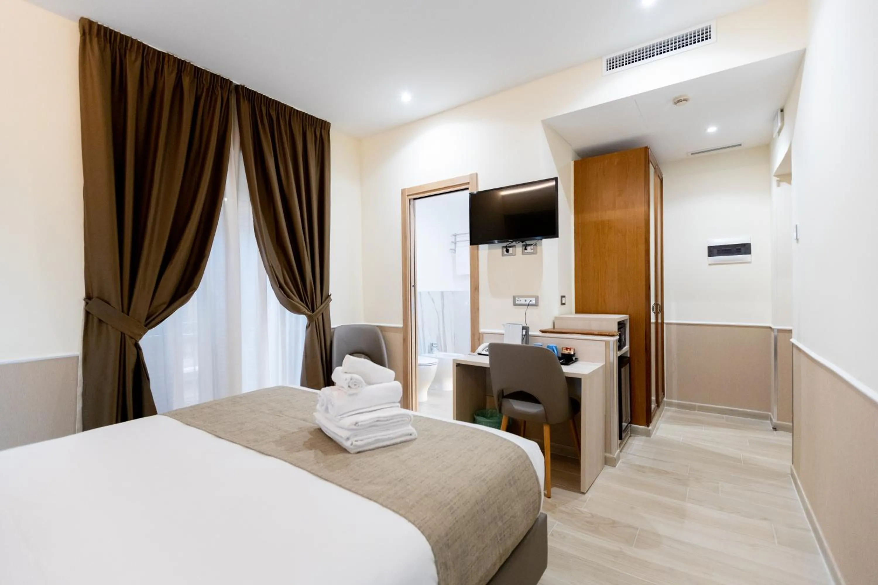 Bed in Hotel Maximus